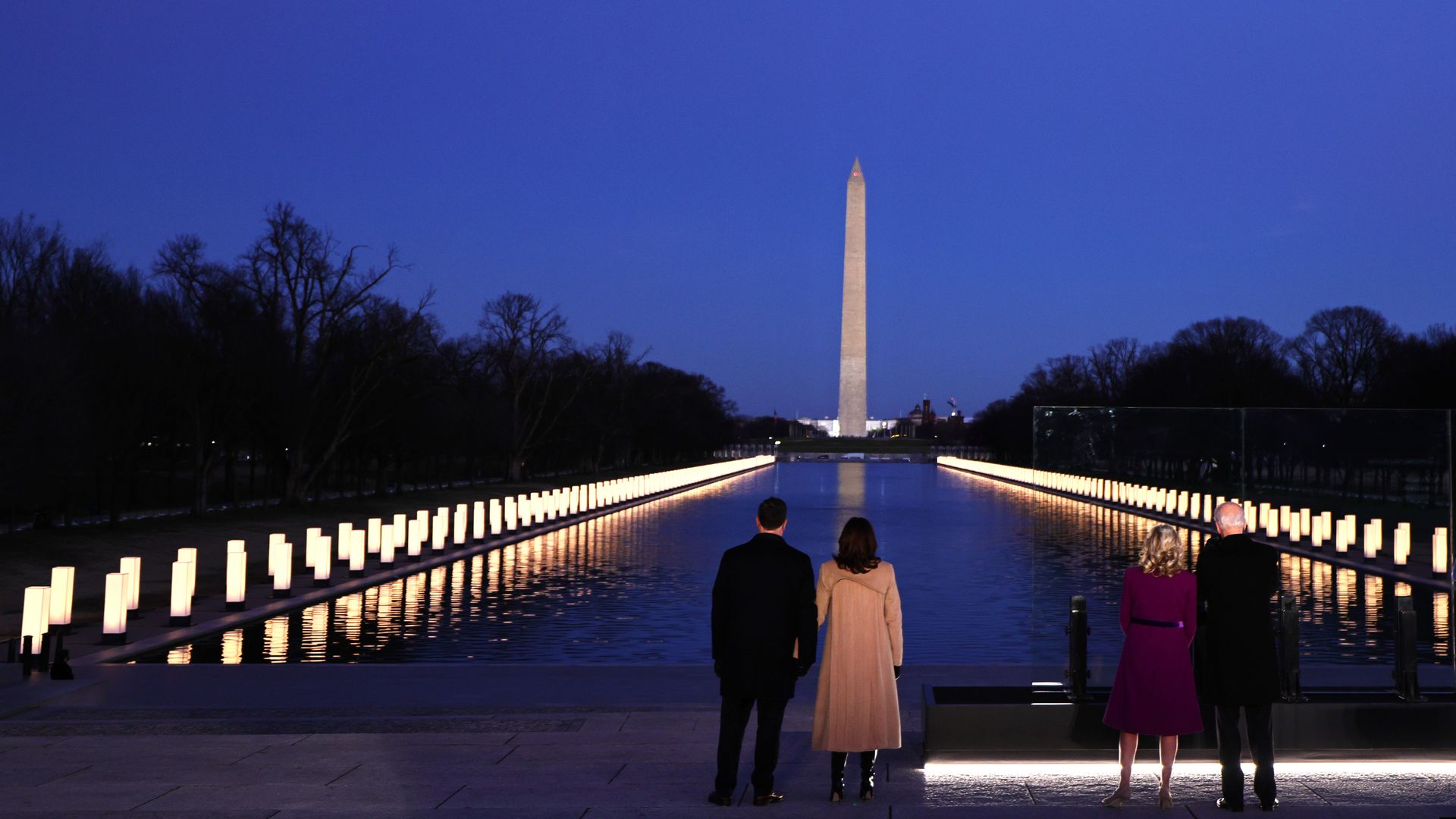 Doug Emhoff, Vice President-elect Kamala Harris, Dr. Jill Biden and President-elect Joe Biden face the Reflecting Pool 