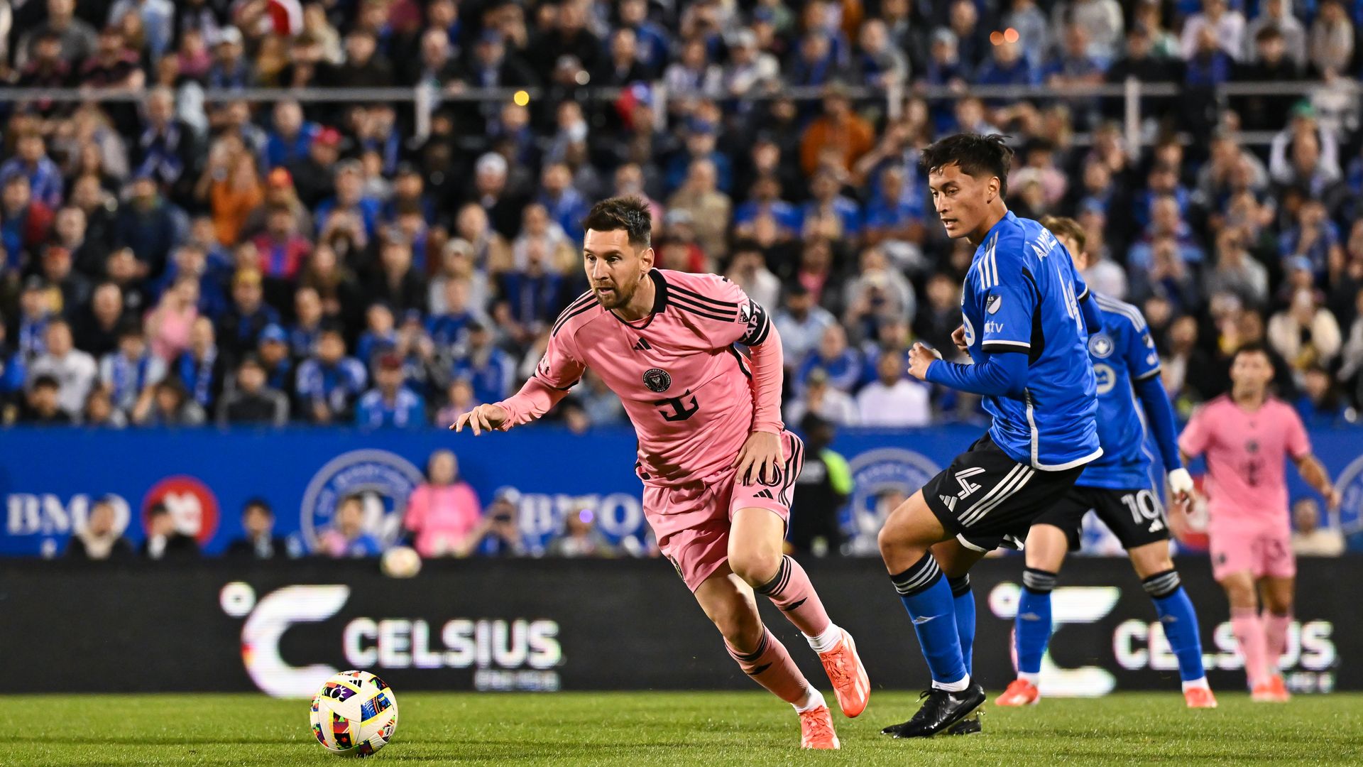 MONTREAL, CANADA - MAY 11: Lionel Messi #10 of Inter Miami runs for the ball past Fernando Álvarez #4 of CF Montréal during the first half at Saputo Stadium on May 11, 2024 in Montreal, Quebec, Canada. Inter Miami defeated CF Montréal 3-2