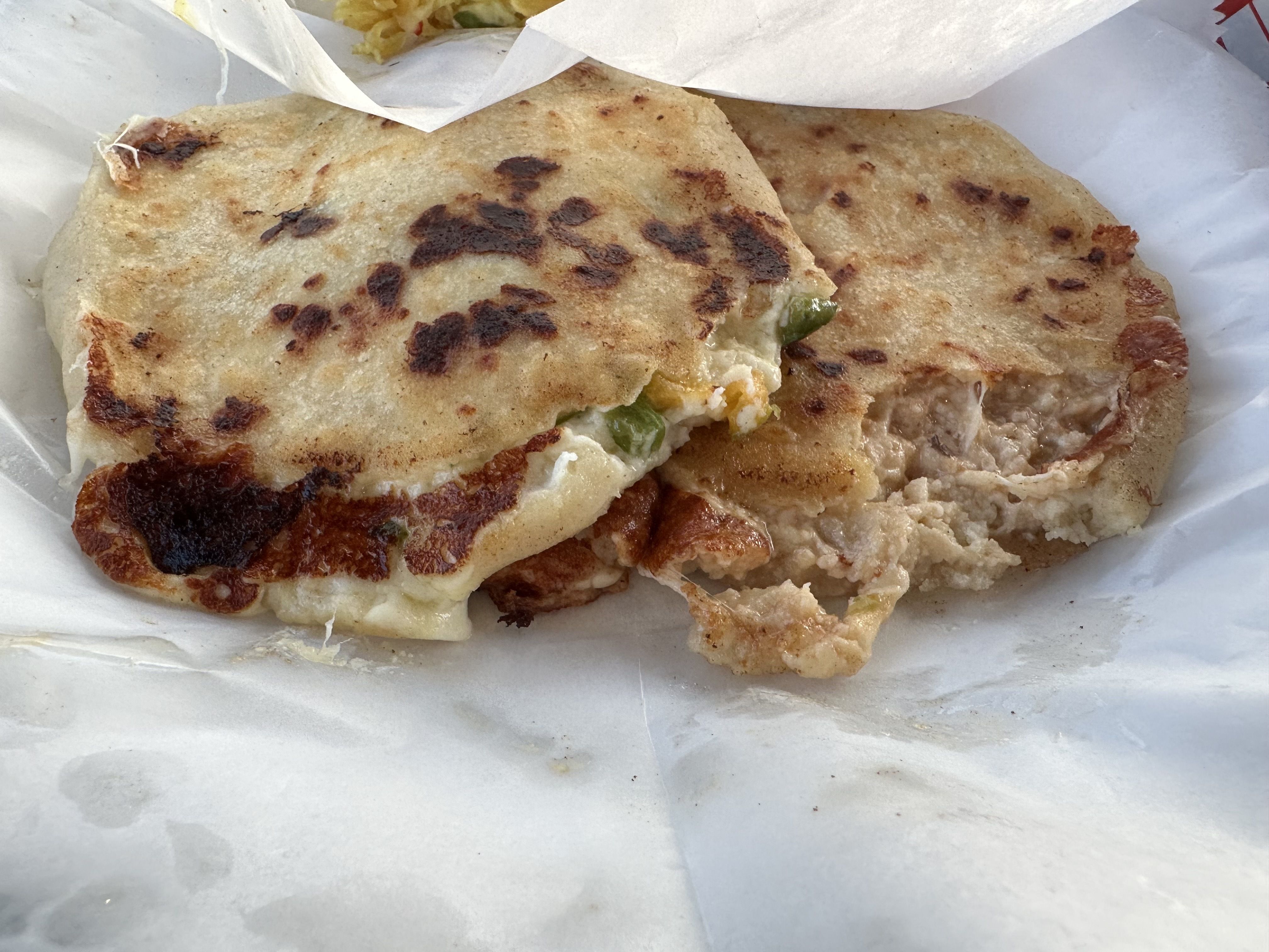 Pupusas! The national dish of El Salvador, griddle cakes made with corn  flour and stuffed with cheese and a choice of pork or chicken. They are  served with coleslaw and a choice, image size:4032x3024