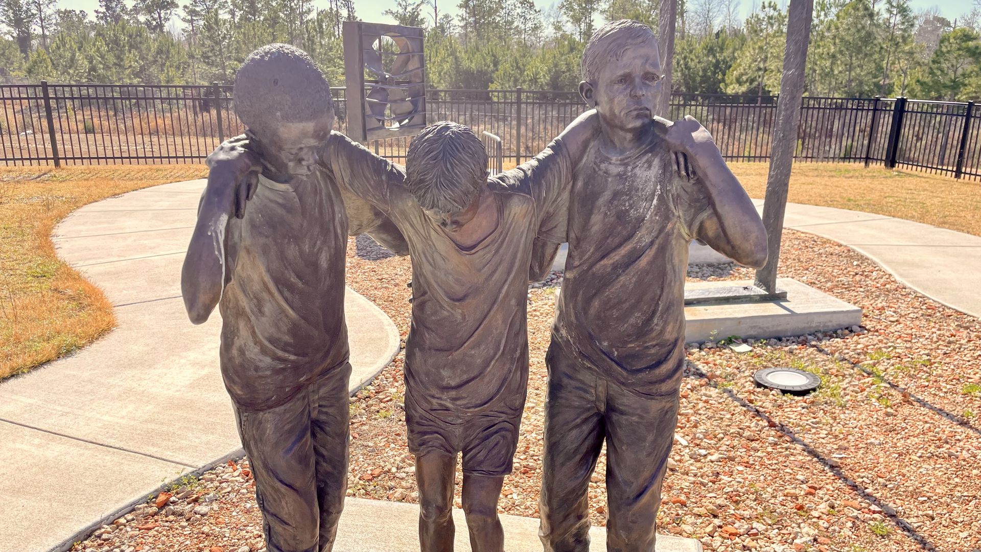 Statues outside the White House, where boys were abused at the former Dozier School for Boys.