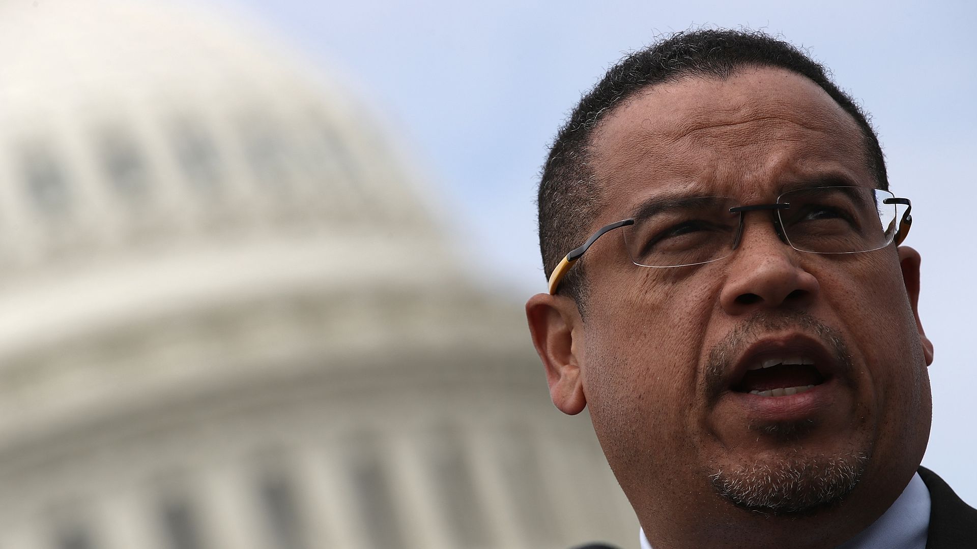 Keith ellison stands in front of the us capitol