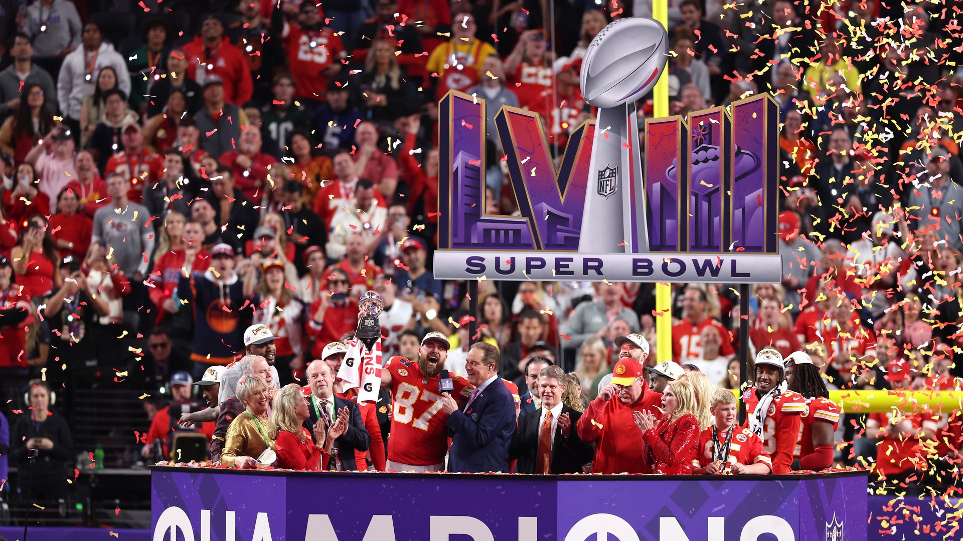  Travis Kelce #87 of the Kansas City Chiefs holds the Lombardi Trophy after defeating the San Francisco 49ers 25-22 in overtime during Super Bowl LVIII at Allegiant Stadium on February 11, 2024 in Las Vegas, Nevada. 