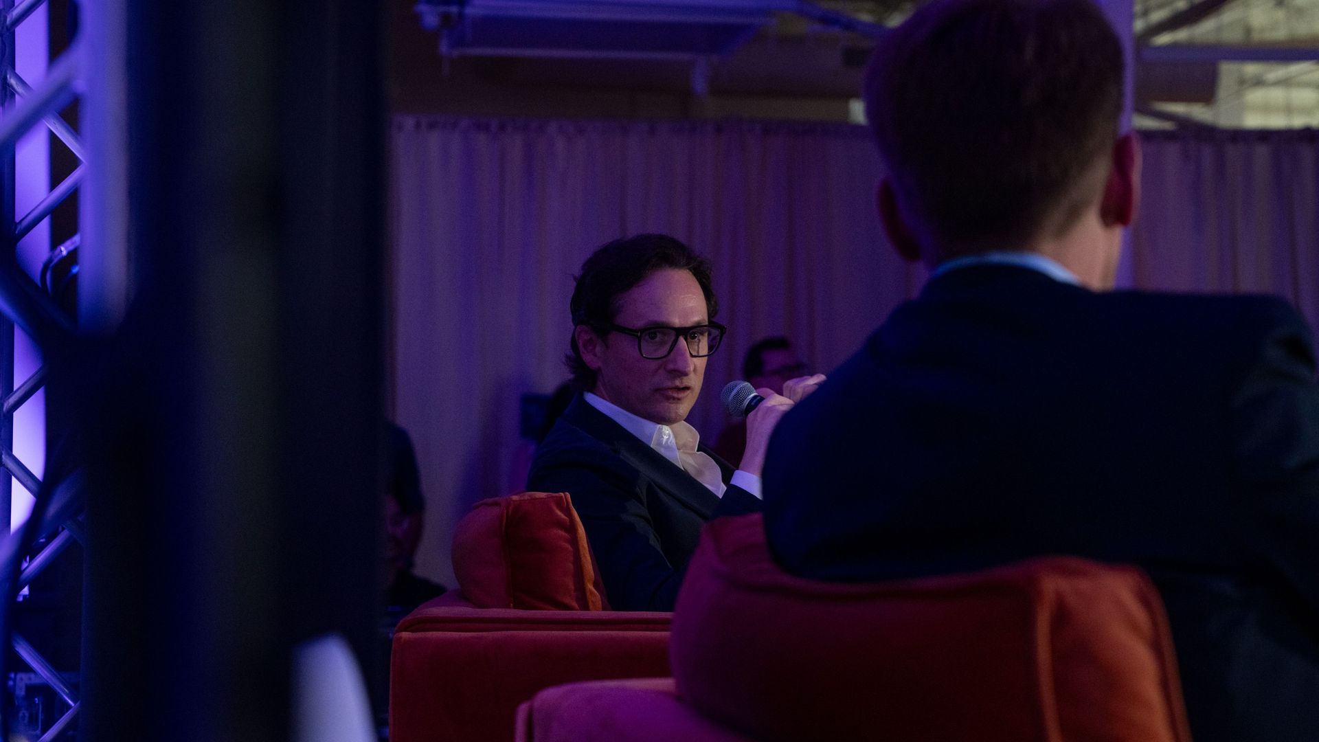 Photo of Jim O'Leary on stage at Axios House SXSW