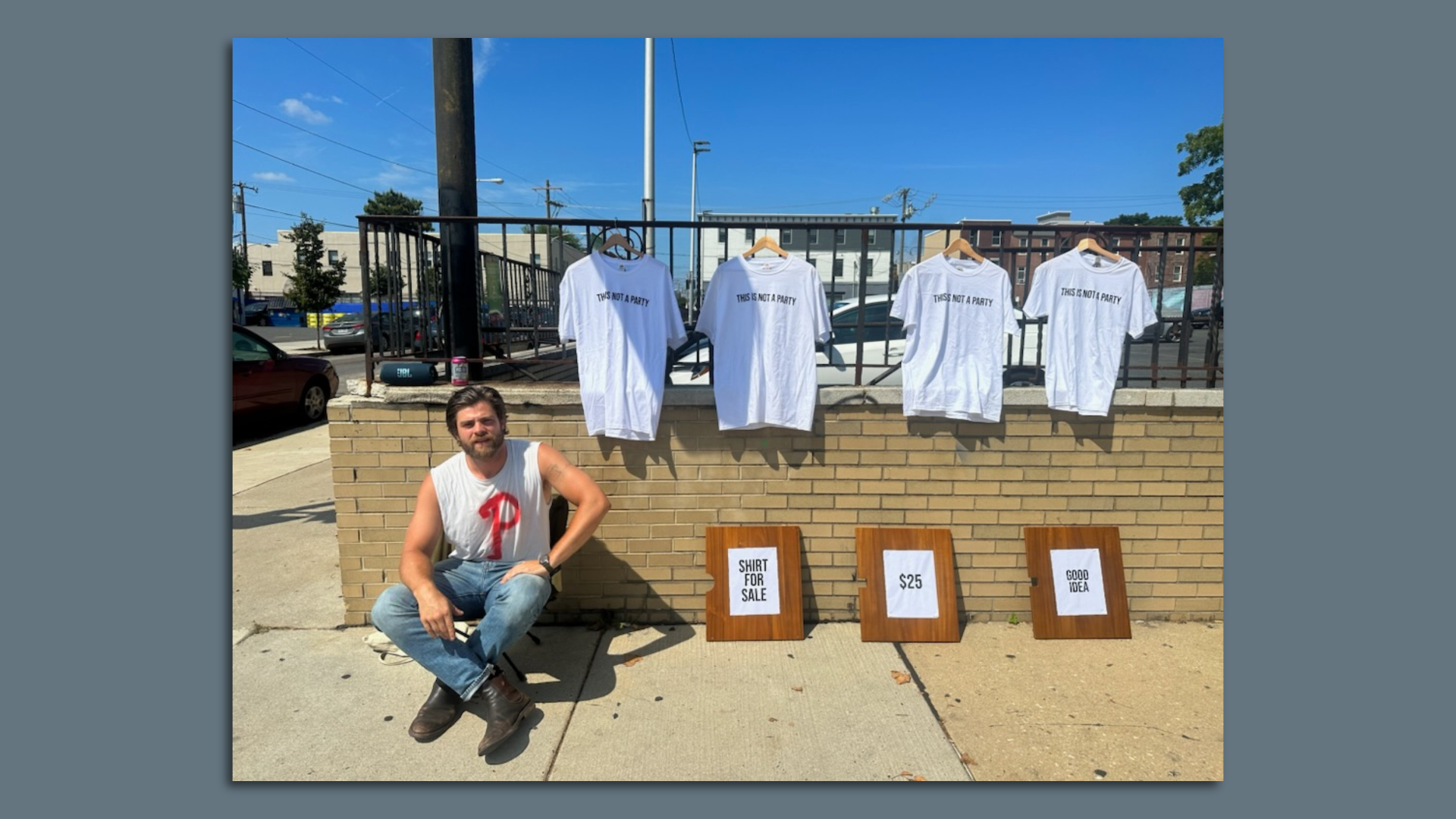 Alexander "Chicken Man" Tominsky selling shirts on Philly's streets. 