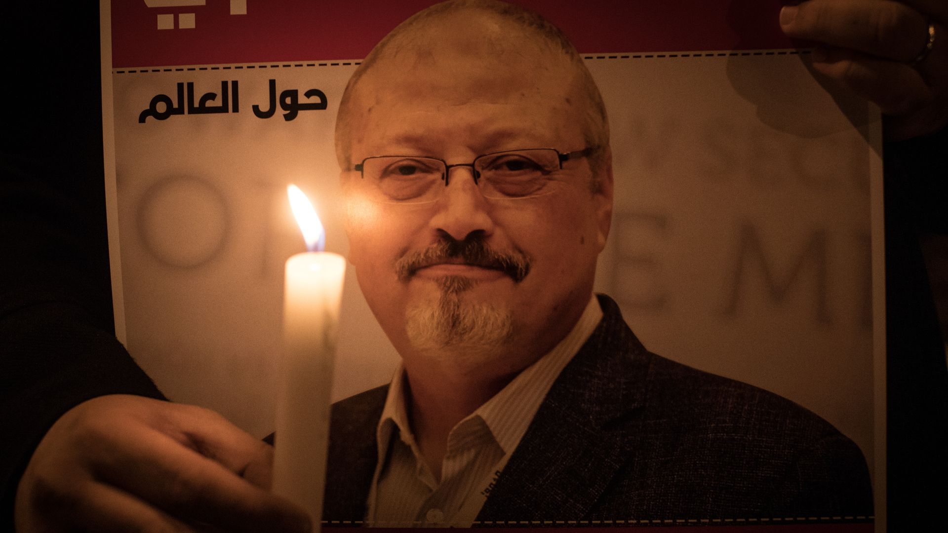 A person holding a picture of journalist Jamal Khashoggi during a vigil for him outside of the Saudi Arabia consulate in Istanbul, Turkey, in October 2018.