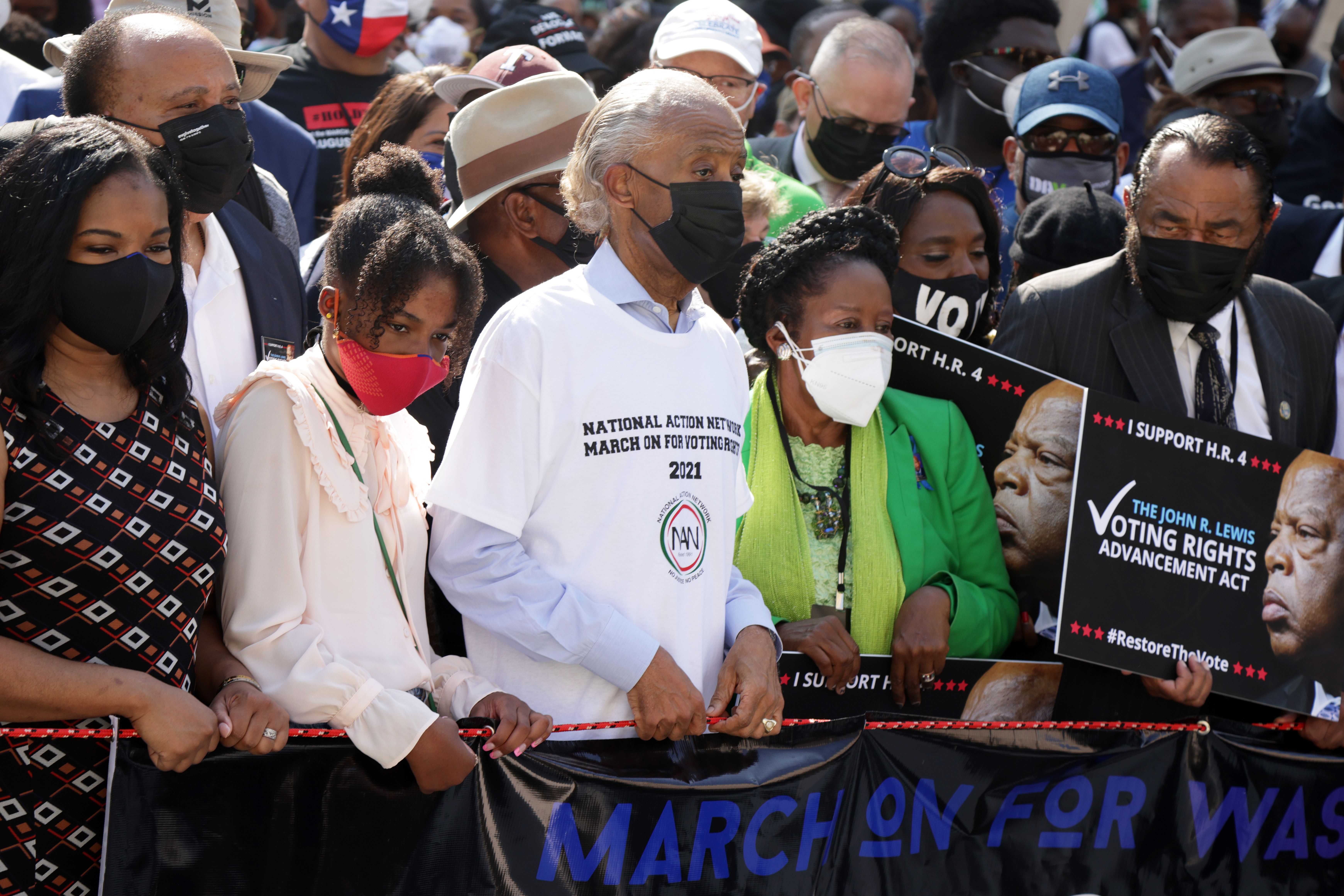 The Rev. Al Sharpton (3rd L, front row), U.S. Rep. Sheila Jackson Lee (D-TX) (4th L, front row) and U.S. Rep. Al Green (D-TX) (R), participates in a March On For Voting Rights.