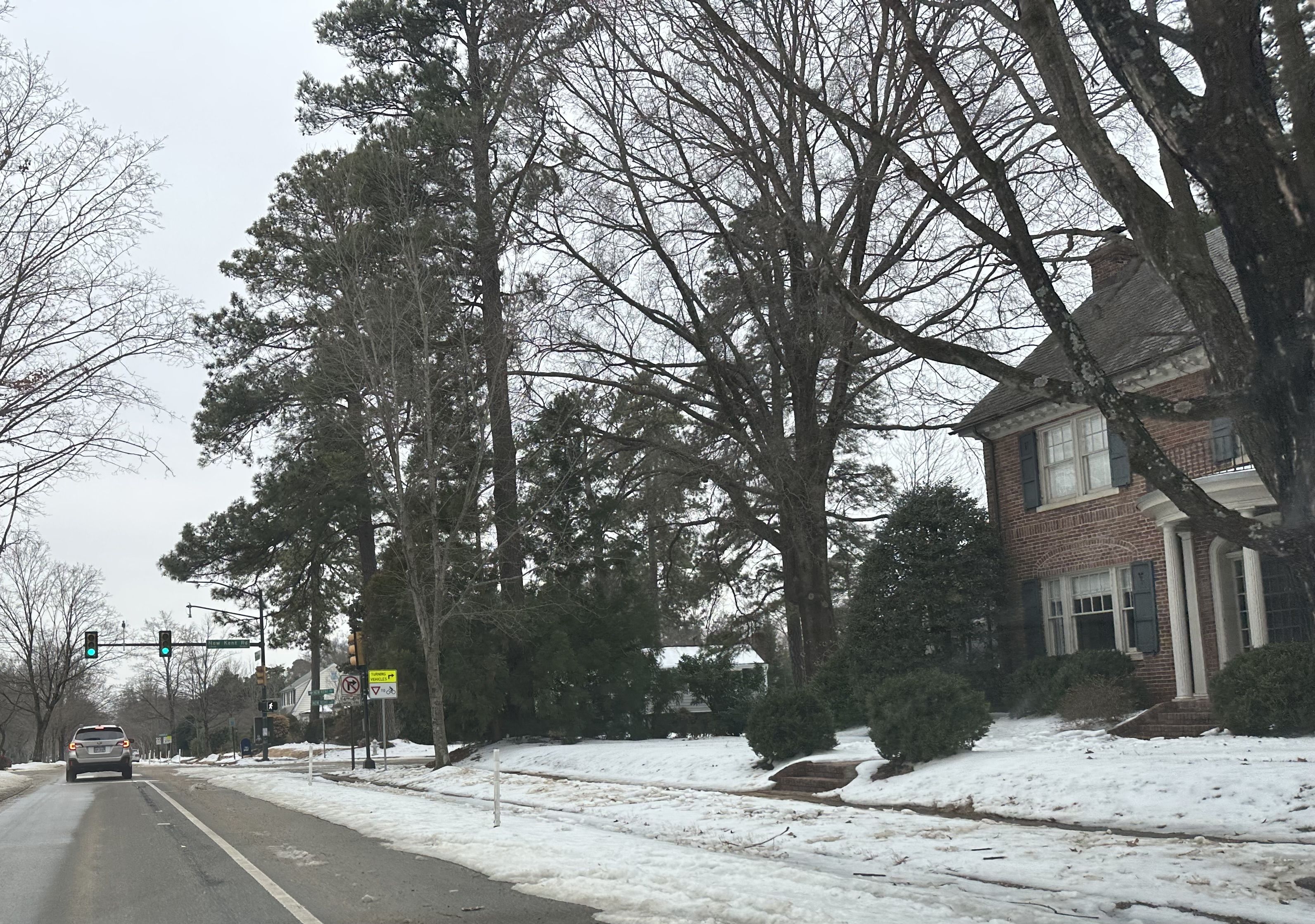 Westover Hills Boulevard in South Richmond on Wednesday afternoon, where the bike lanes and many of the sidewalks remain covered in ice. Photo: Karri Peifer/Axios 
