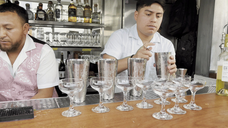 A bartender makes a batch of drinks at Cubita in San Francisco.