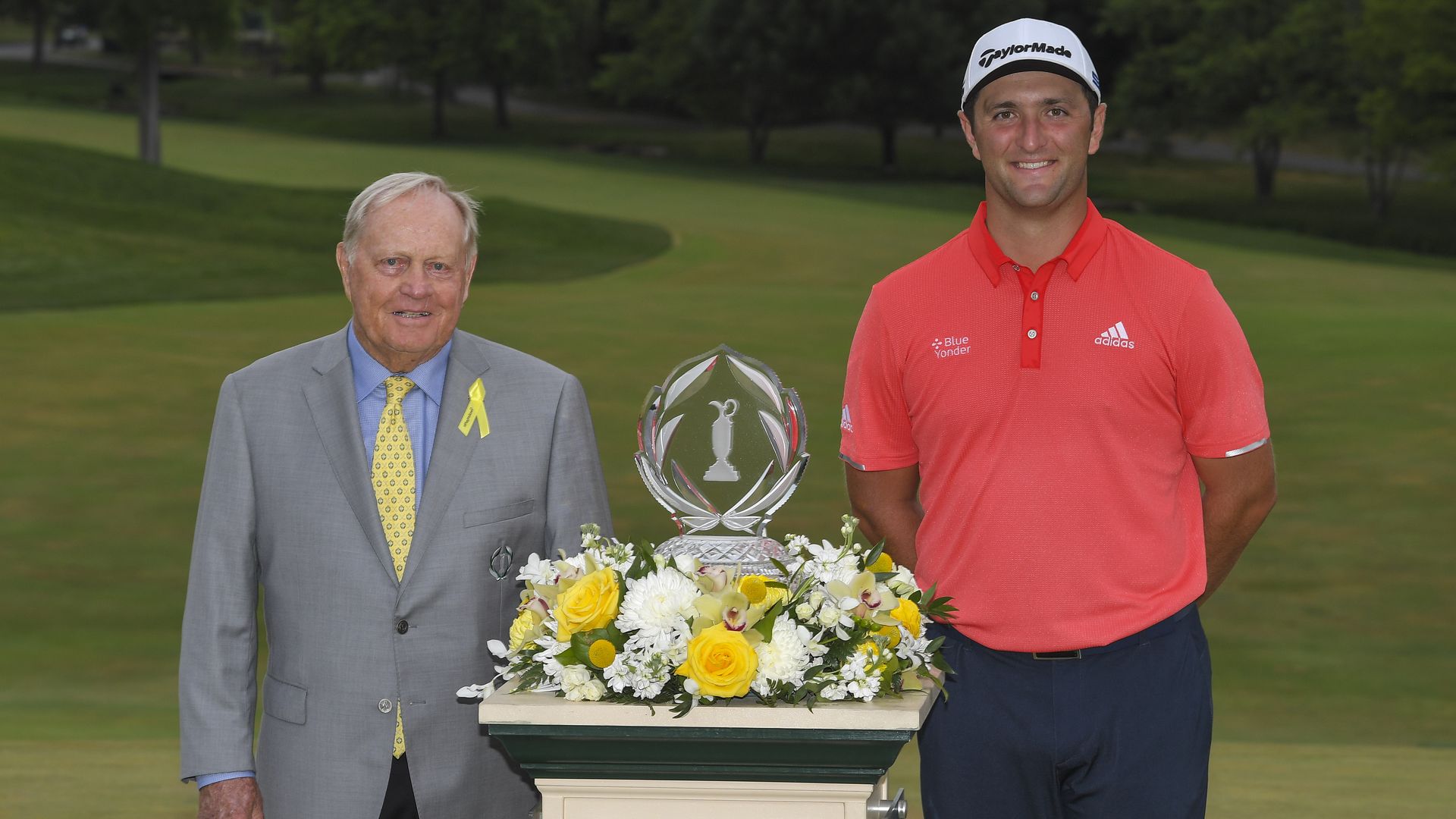 Jon Rahm standing with Jack Nicklaus