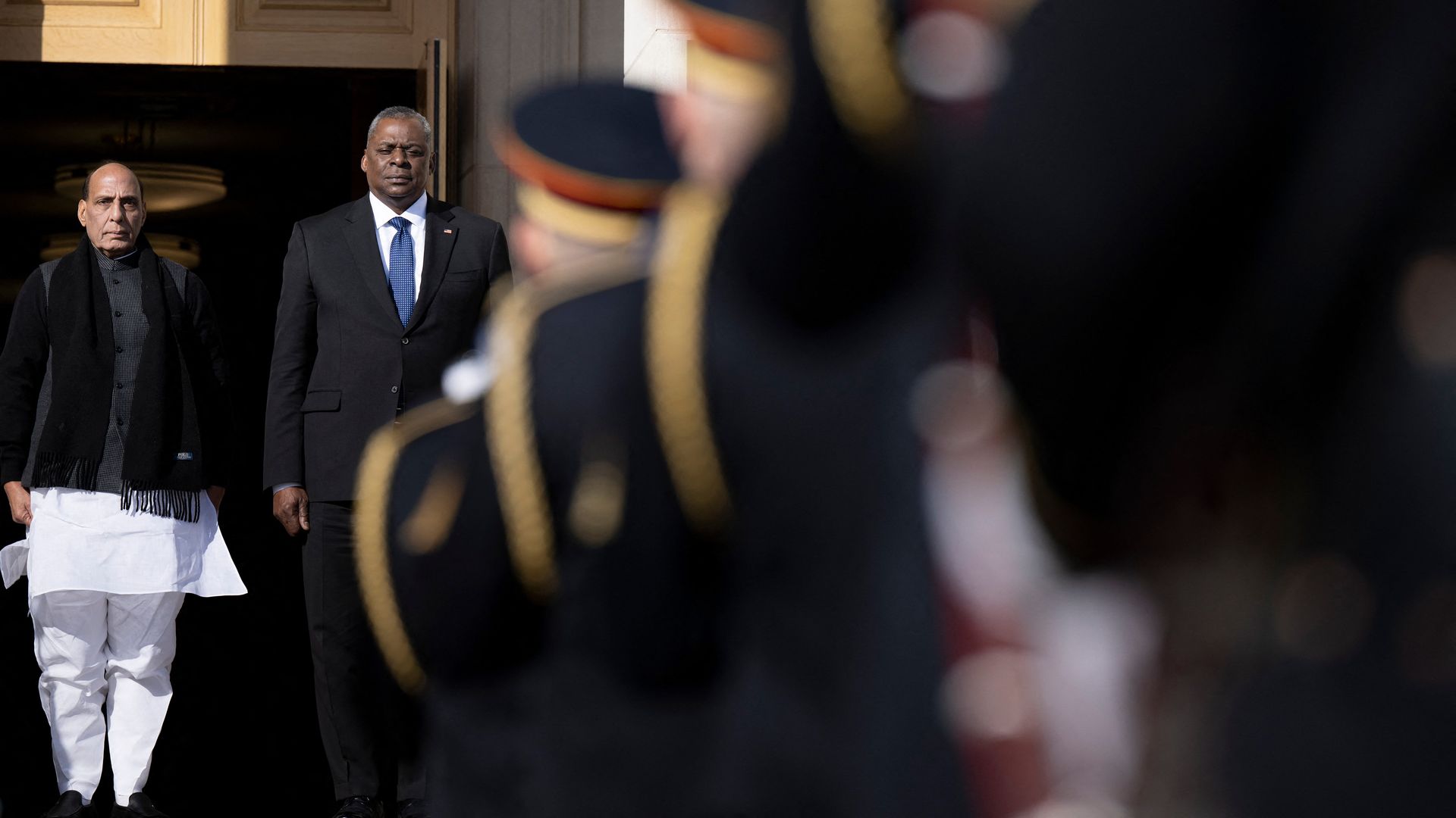 Defense Secretary Lloyd Austin is seen welcoming India's defense minister to the Pentagon.