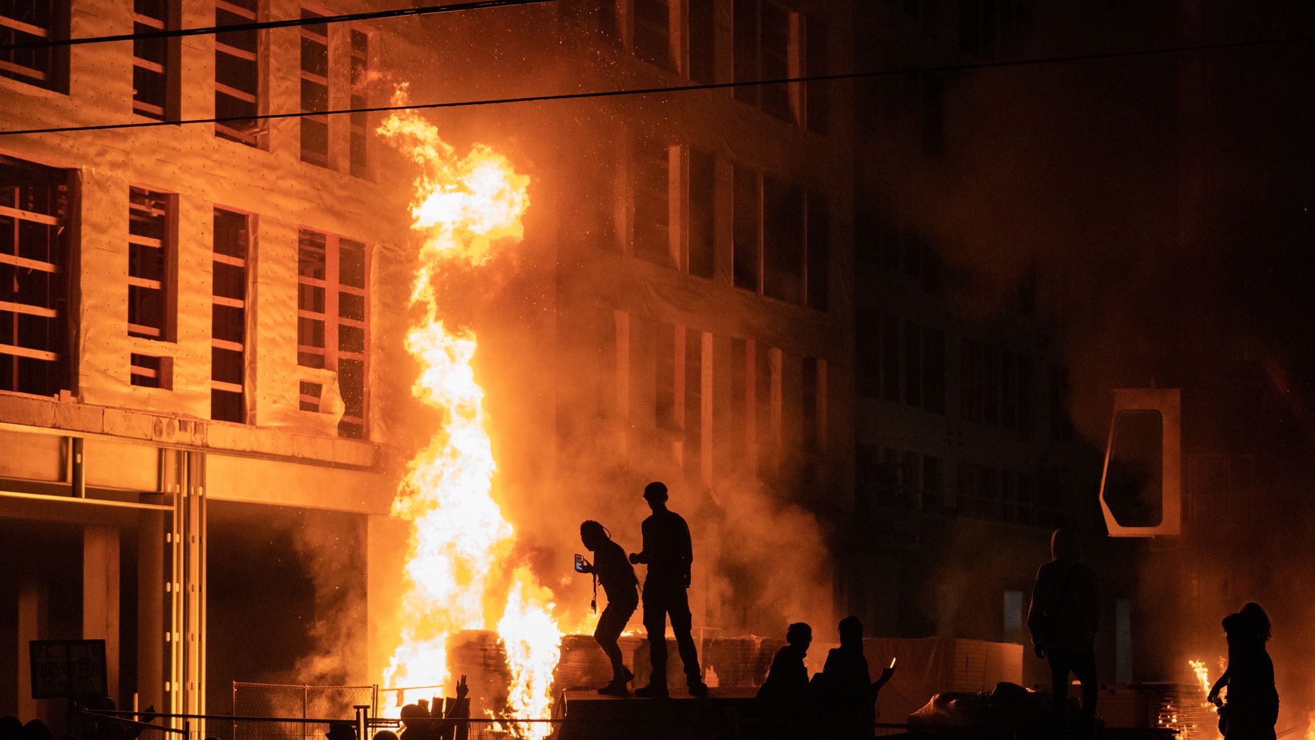 Rioters set fire to a multi-story affordable housing complex under construction near the Third Precinct.