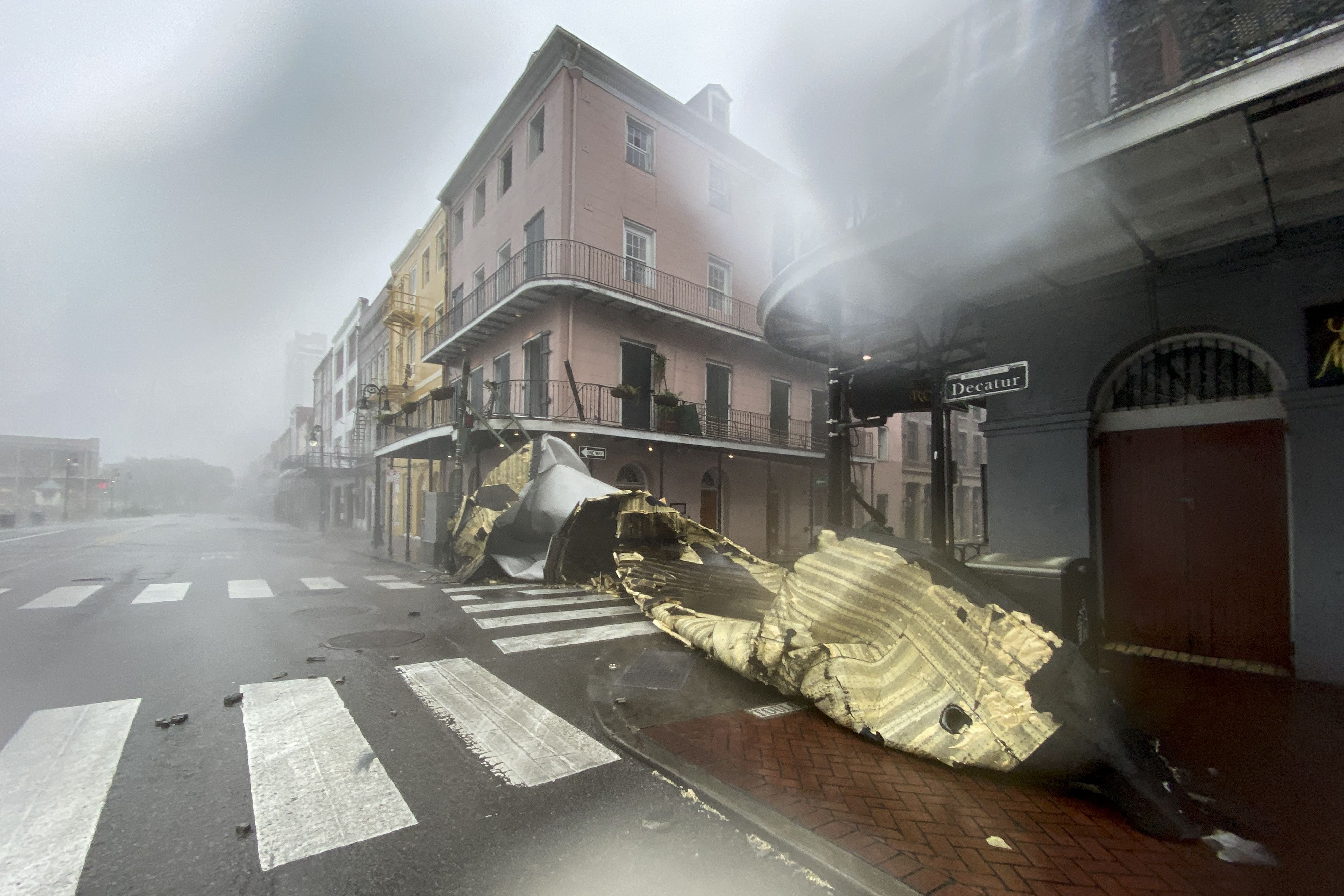 A section of a building's roof is seen after being blown off during rain and winds in the French Quarter of New Orleans, Louisiana. Photo: Patrick Fallon/AFP via Getty Images