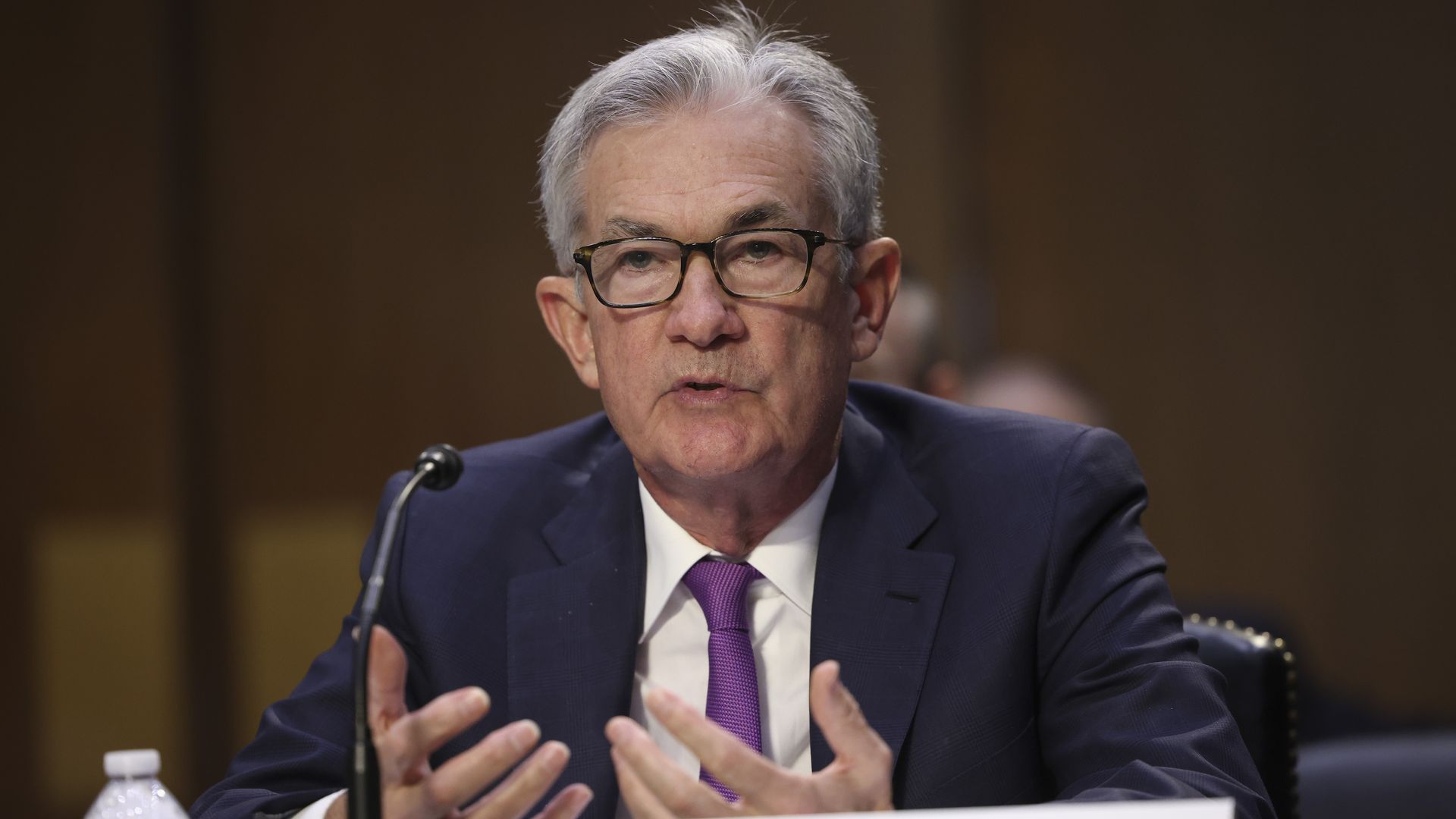 Federal Reserve Chair Jerome Powell is seen testifying to Congress.