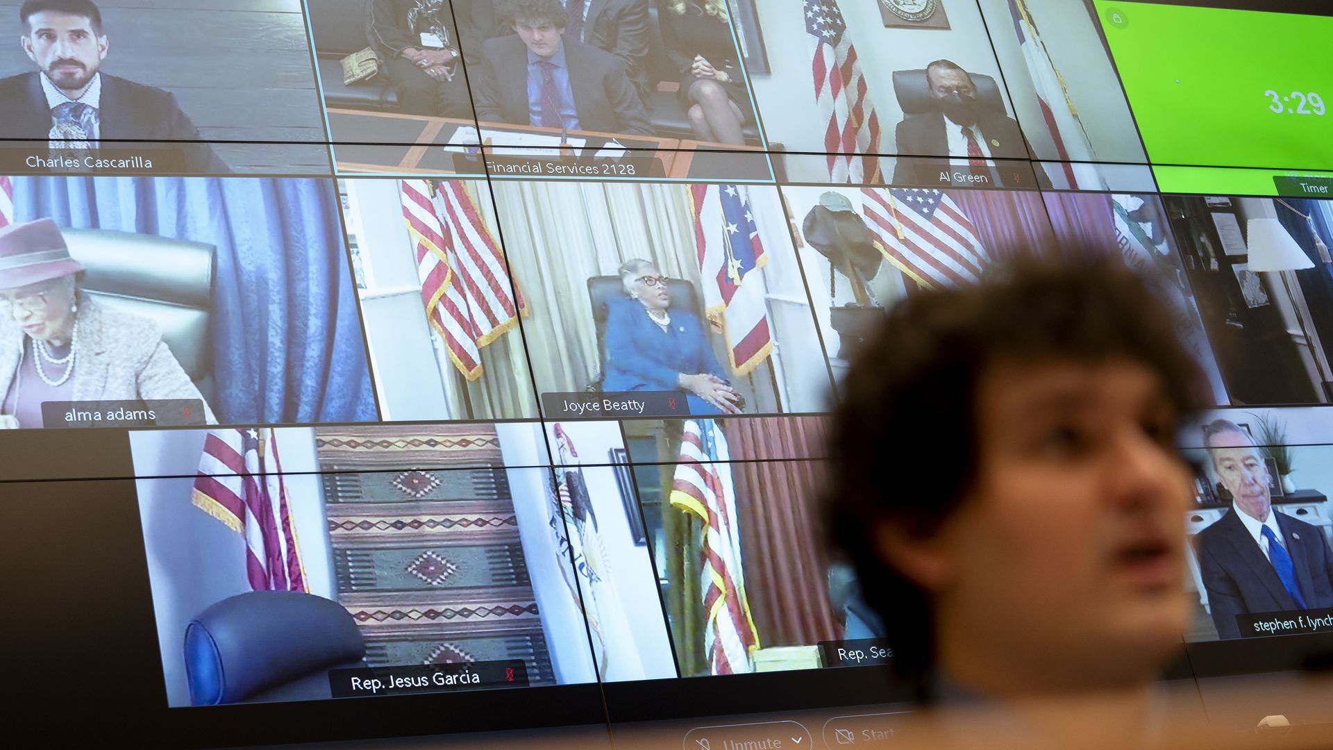 Members of Congress listen via video conference as FTX CEO, Sam Bankman-Fried testifies on Wednesday. 