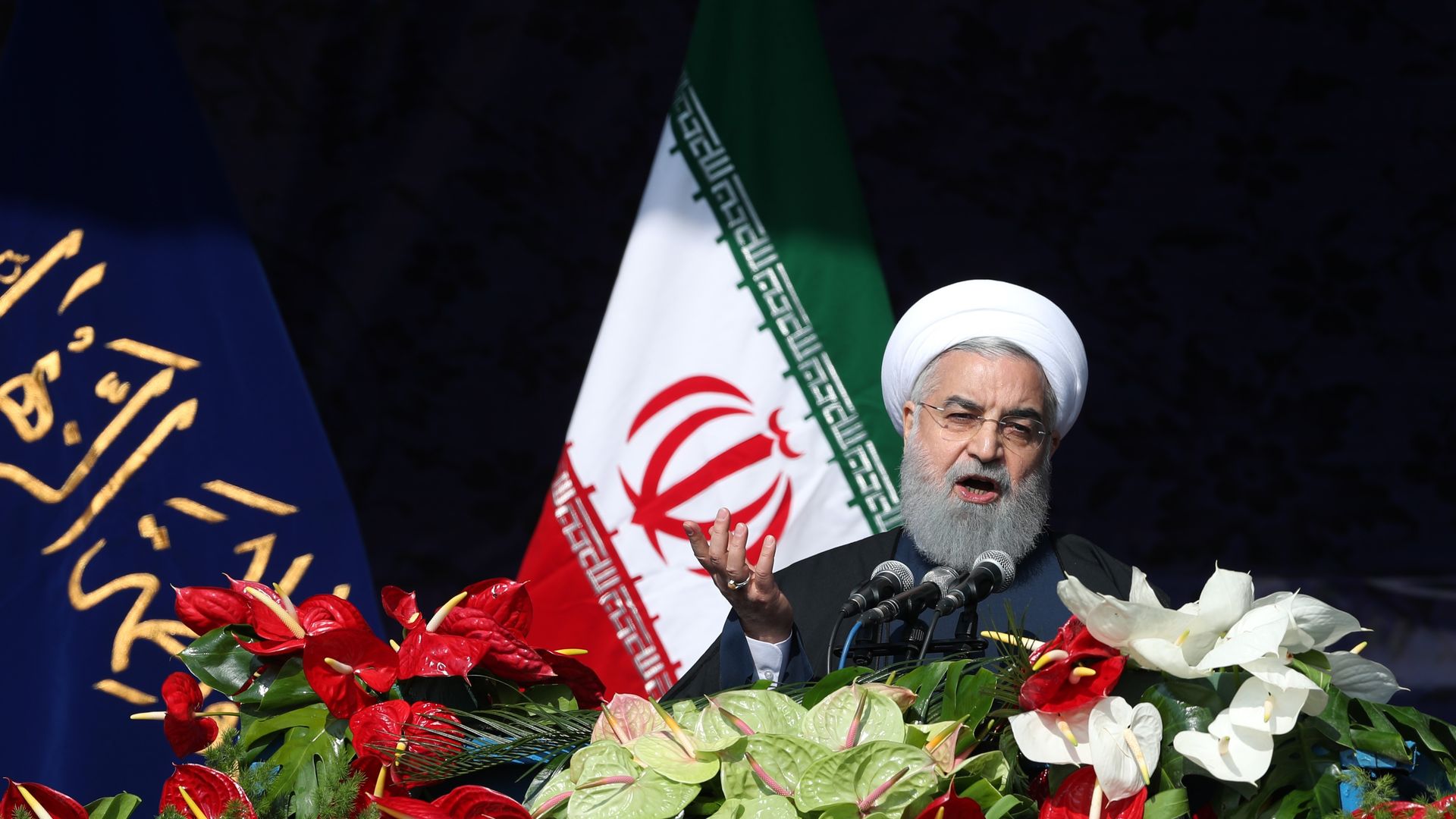 Iranian President Hassan Rouhani delivers a speech during a ceremony to mark the 39th anniversary of the Islamic revolution on February 11, 2018
