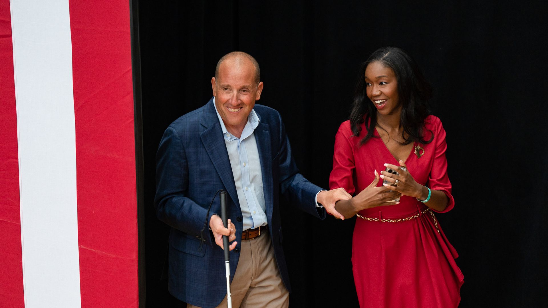 Justice Richard Bernstein (L) and Kyra Bolden (R) at a Michigan Democrats event for for Governor Gretchen Whitmer with President Barack Obama ahead of the 2022 midterm elections.