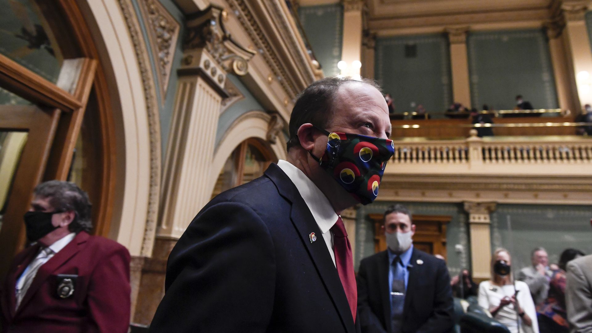 A photo of Colorado Gov. Jared Polis in the Colorado State Capitol Building