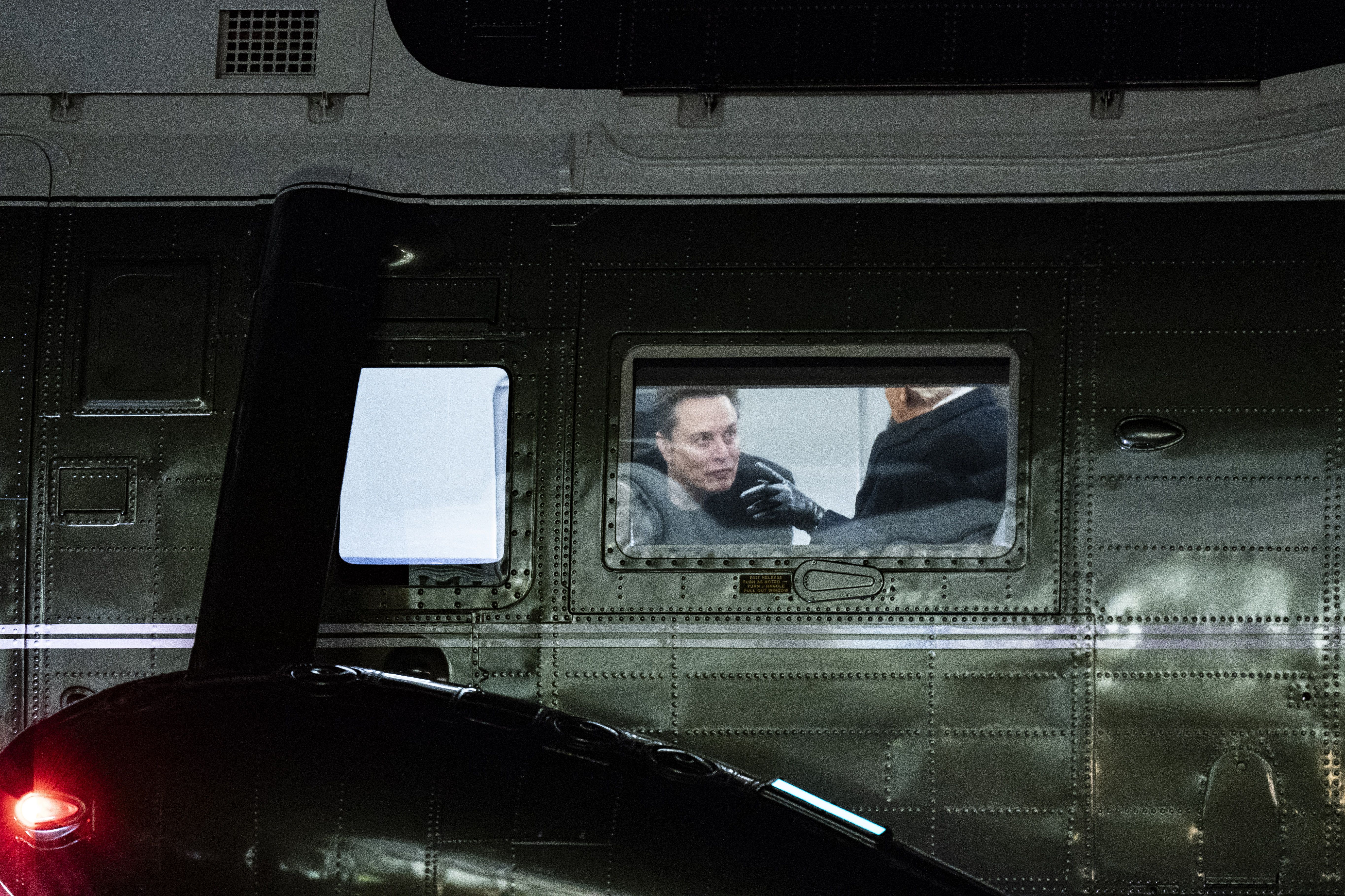 Elon Musk and President Trump speak on Marine One after landing on the White House South Lawn last week.