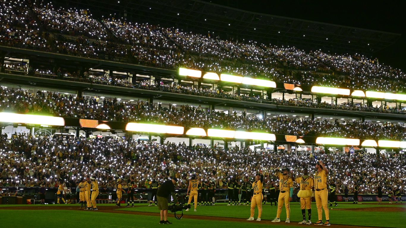 Savannah Bananas slide into Coors Field