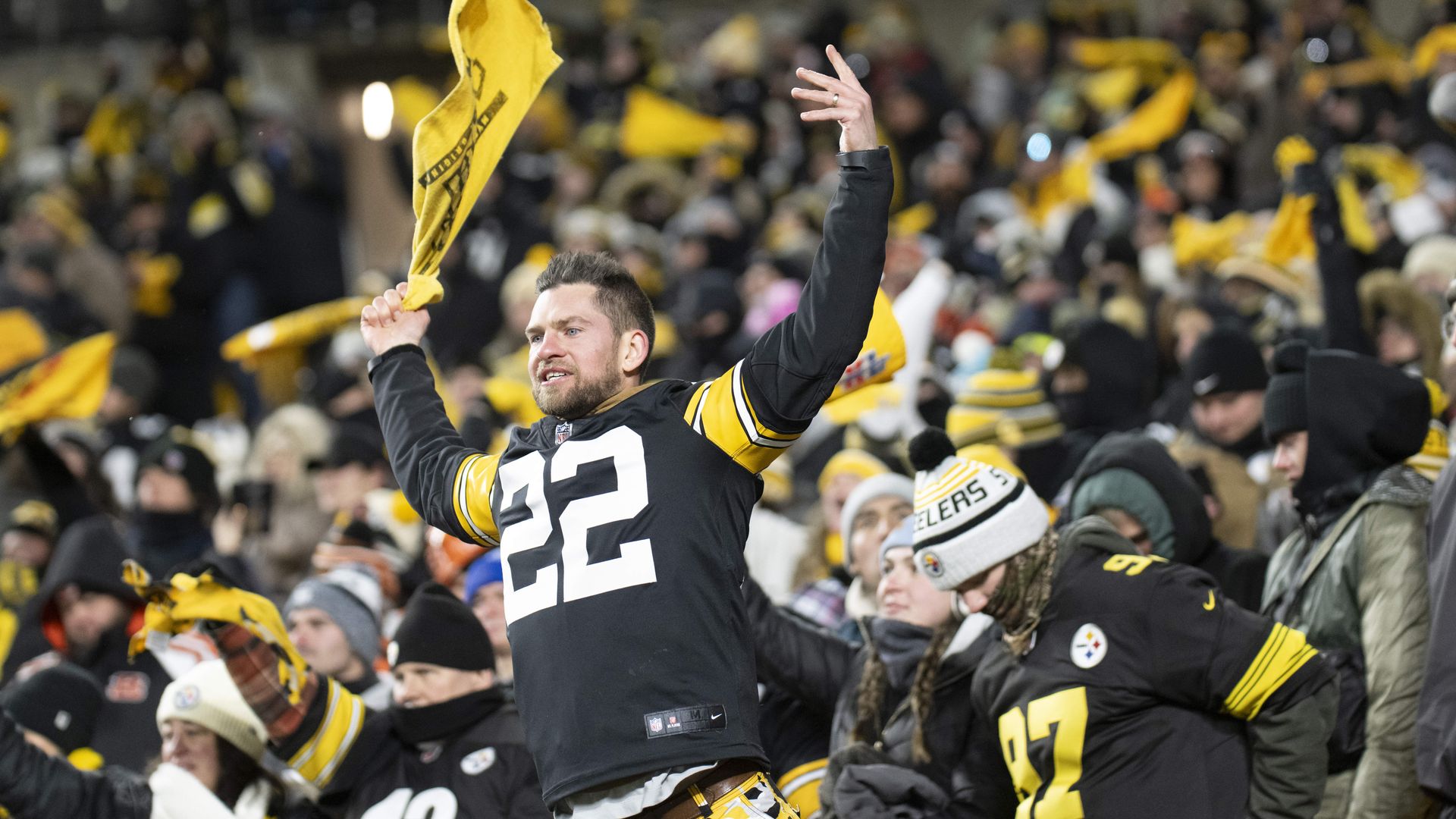 Steelers fan cheering during he game between the Pittsburgh Steelers and the Cincinnati Bengals at Acrisure Stadium on January 4, 2025 in Pittsburgh, P