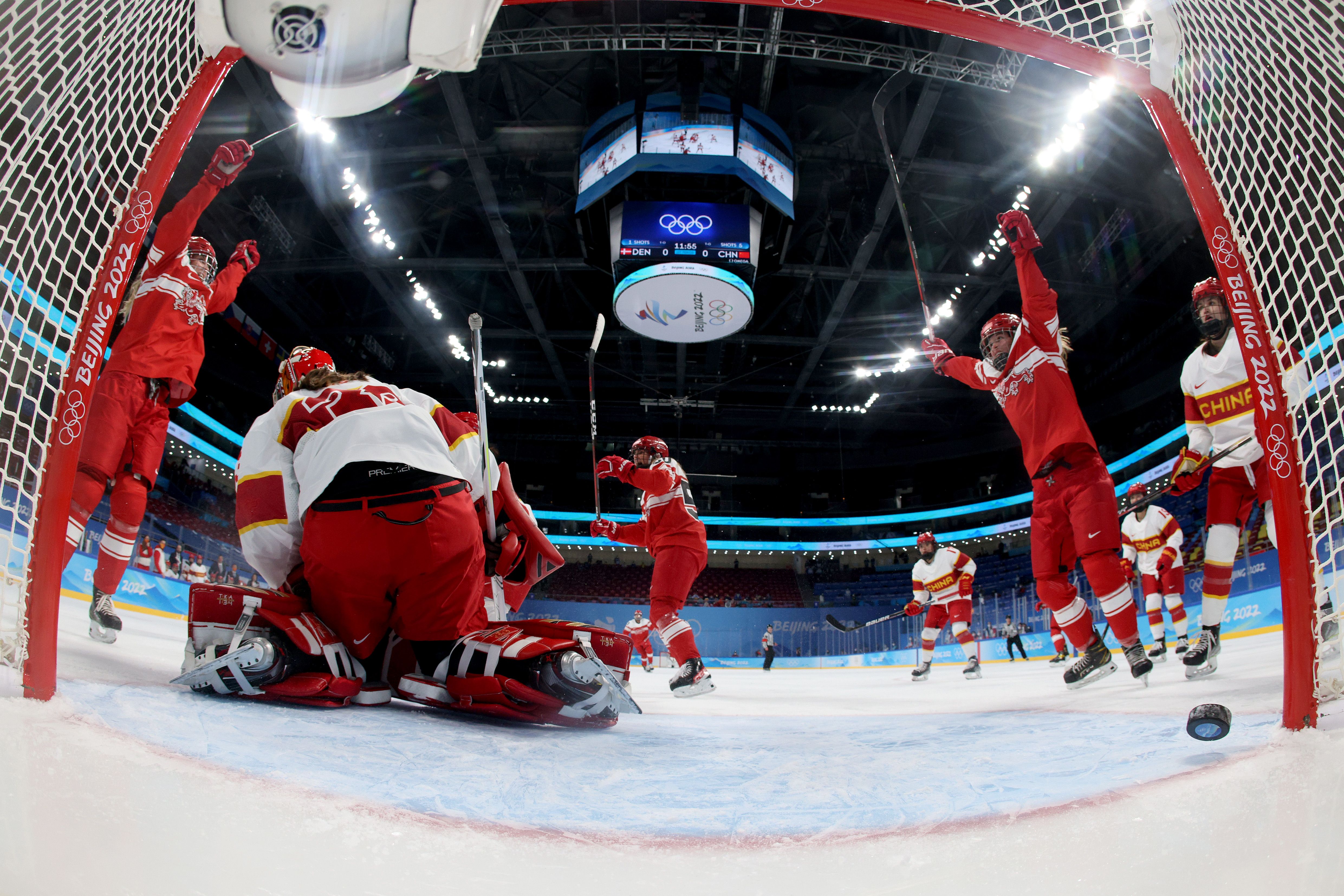 : Malene Frandsen #89 of Team Denmark celebrates a goal in the first period during their Women's Preliminary Round Group B match against Team China on February 04, 2022 in Beijing.
