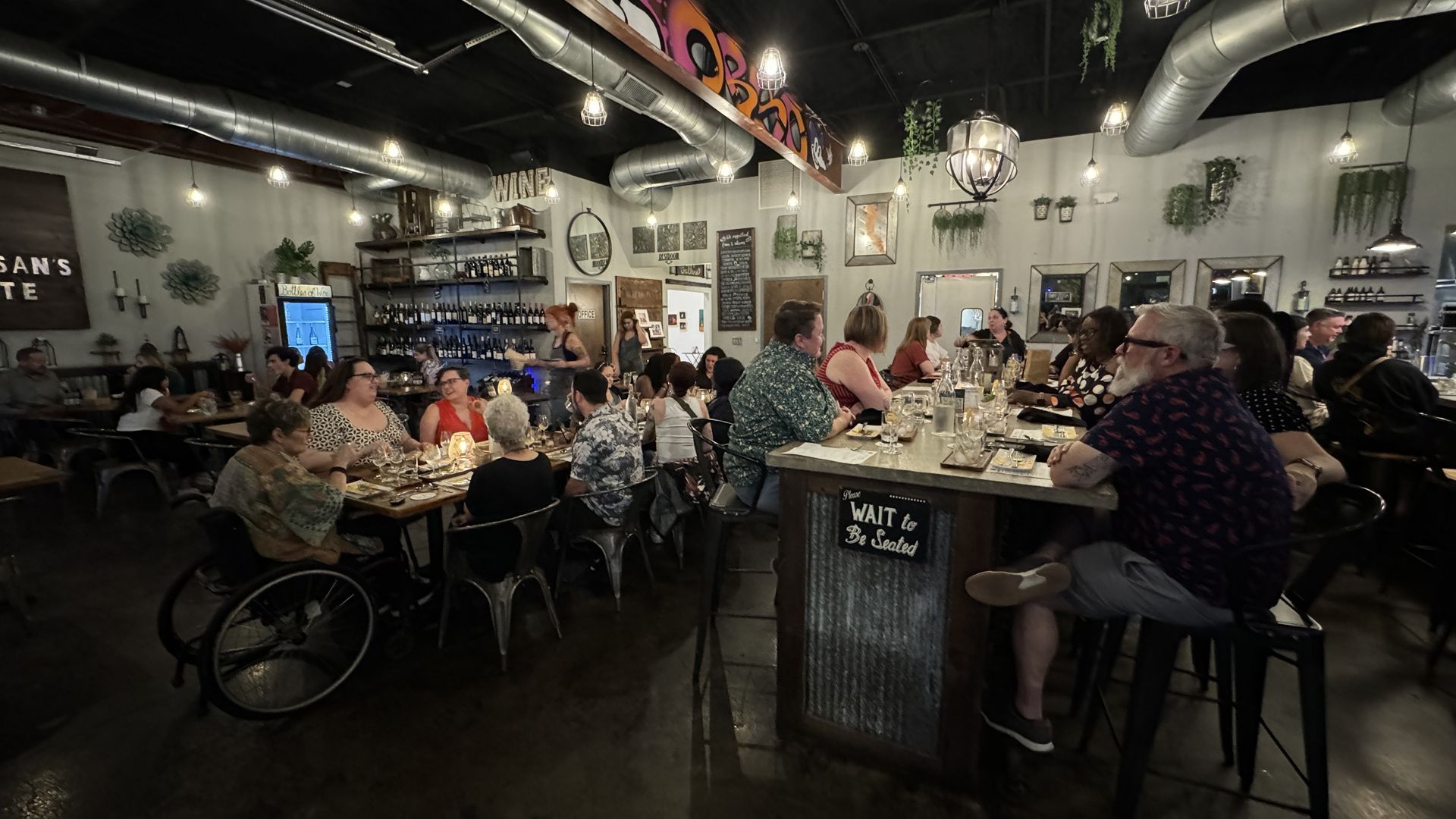 People sit at tables