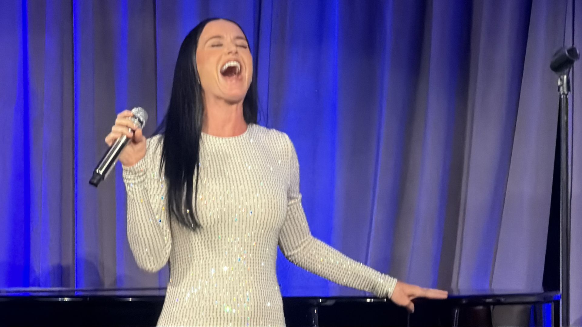 Katy Perry performing an acoustic set at Marc Benioff's Dreamforce dinner