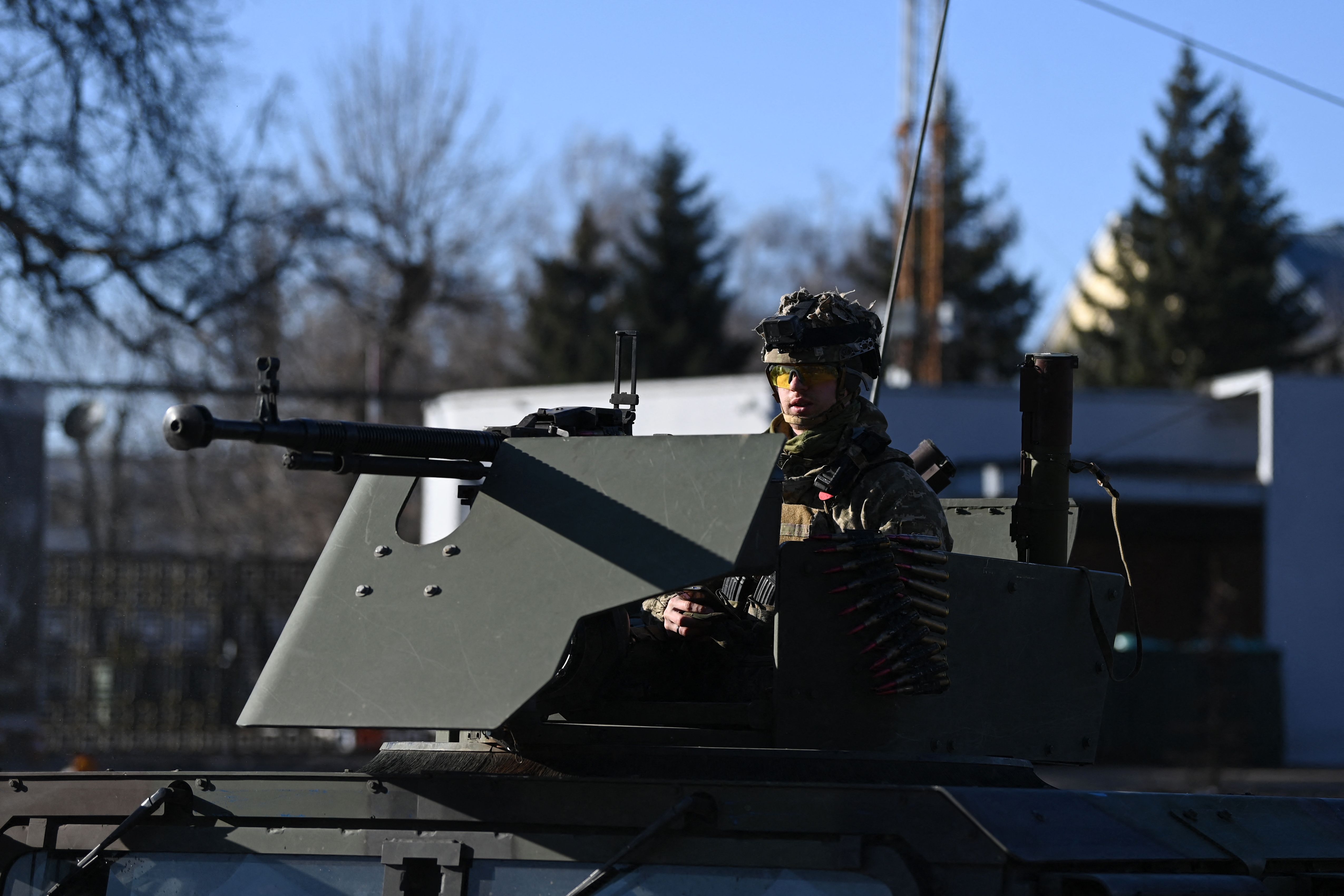 A Ukrainian soldier in an armored vehicle in Kyiv on Feb. 26. Photo: Daniel Leal/AFP via Getty Images