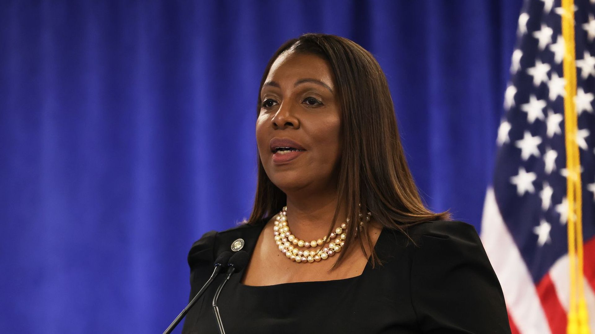 Letitia James speaking at a press conference.