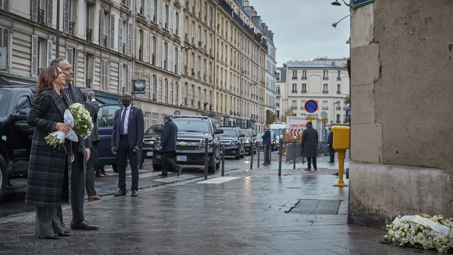 Vice President Kamala Harris and her husband Douglas Emhoff stand on the corner of Rue Alibert and Rue Bichat, the scene of one of the 13th November 2015 Paris terror attacks.