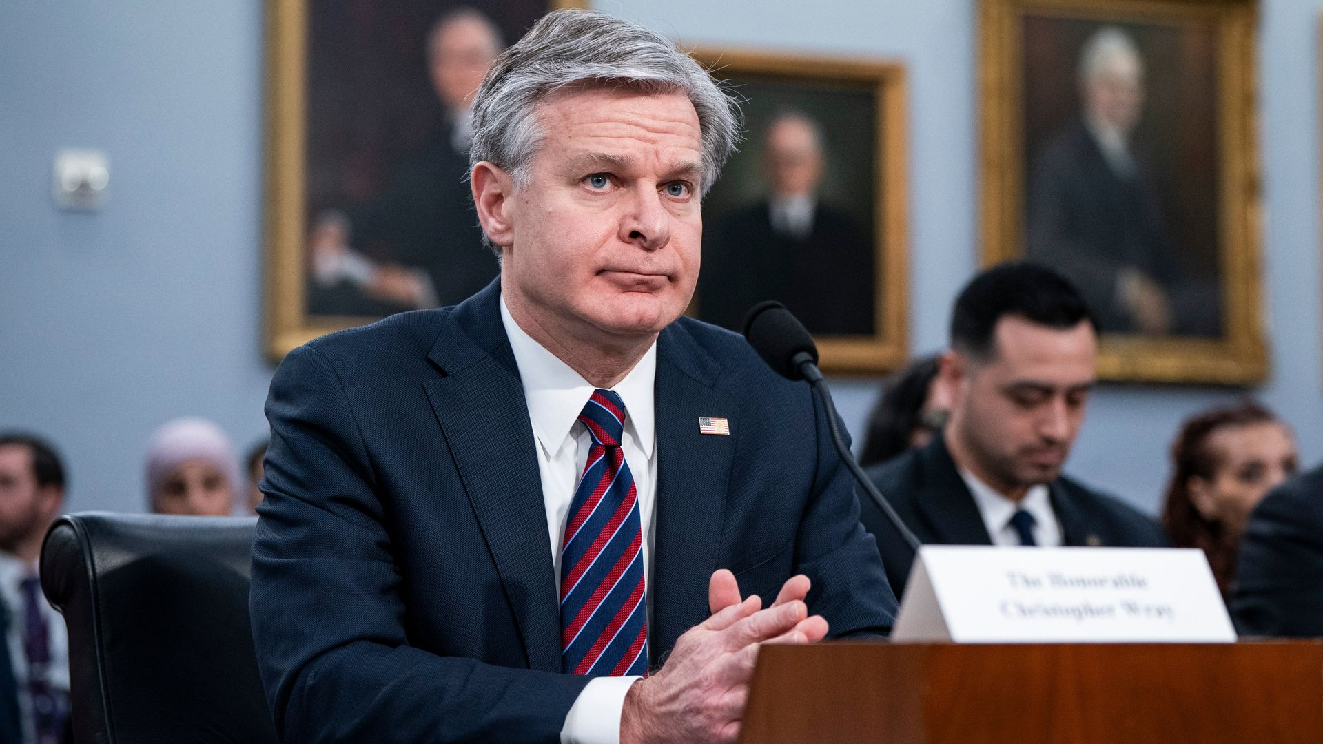 FBI Director Christopher Wray speaking before a House subcommittee on April 11.