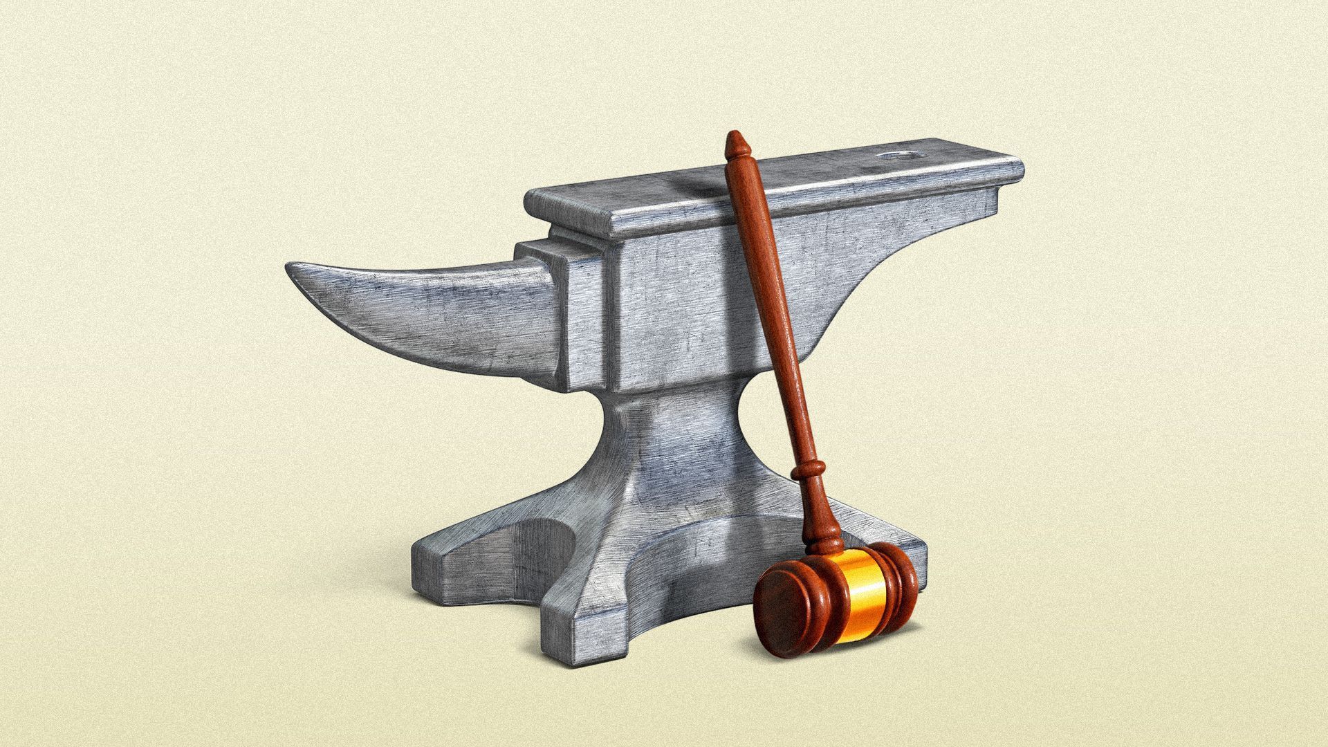 An iron anvil with a judicial gavel next to it. 
