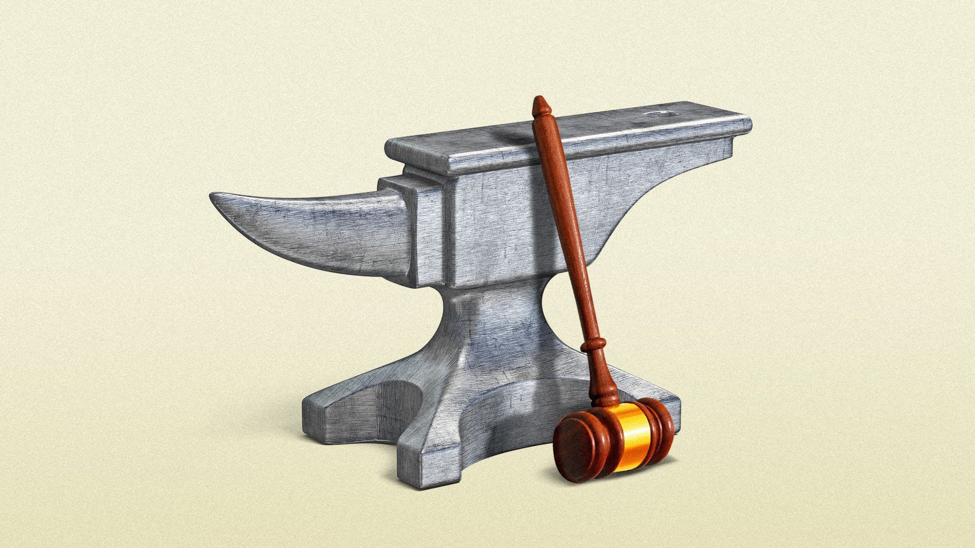 An iron anvil with a judicial gavel next to it.