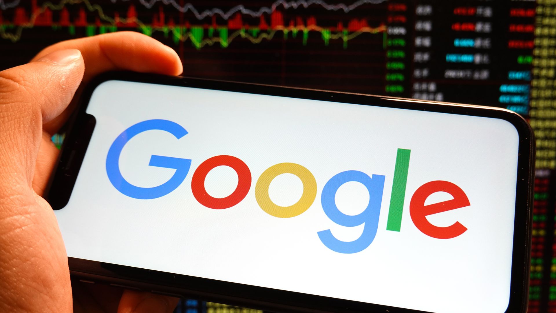 Google logo is pictured on a smartphone screen