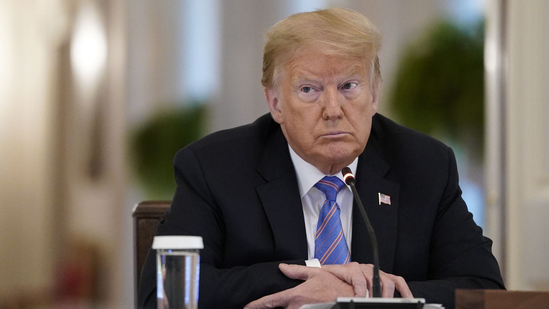 President Donald Trump participates in a meeting of the American Workforce Policy Advisory Board in the East Room of the White House on June 26