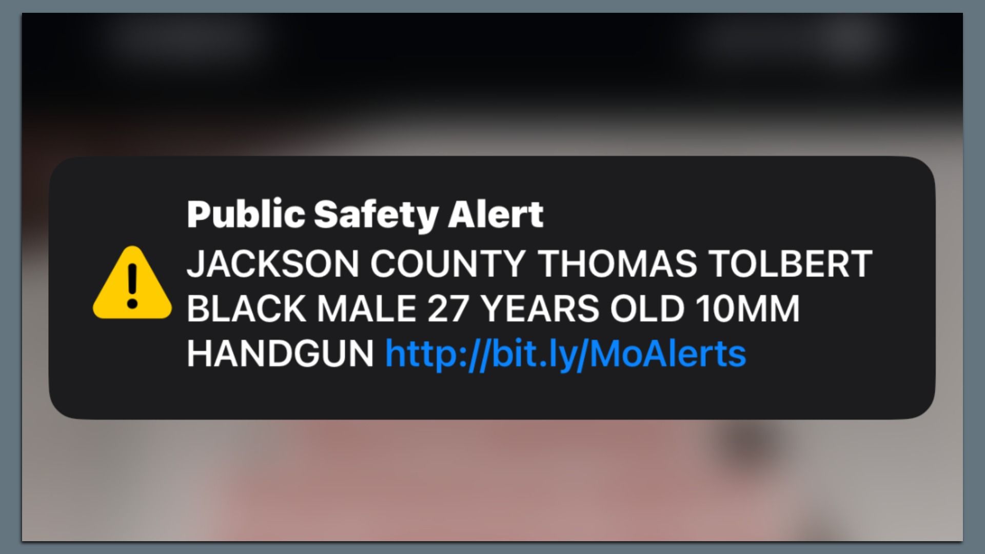 A screenshot from a phone shows a "public safety alert" notification