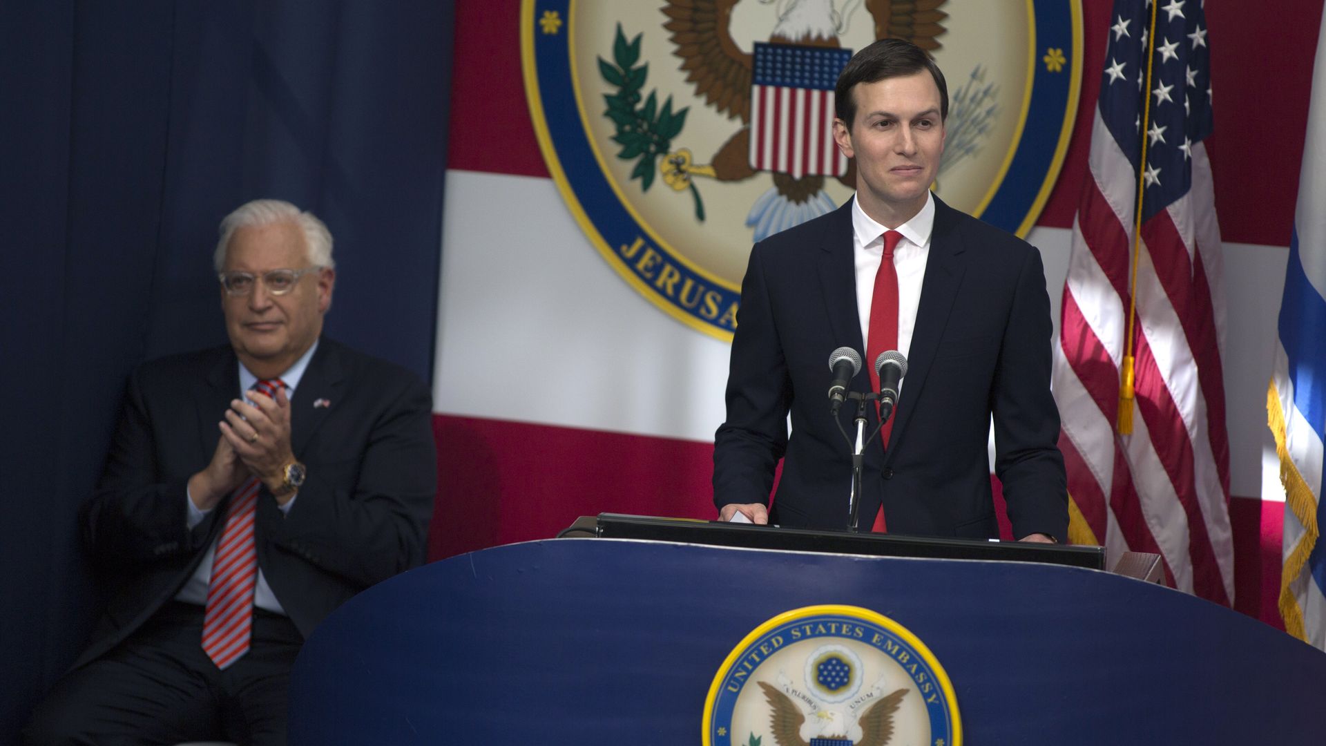 Jared Kushner speaks on stage as U.S. ambassador to Israel David Friedman looks on during the opening of the US Embassy in Jerusalem