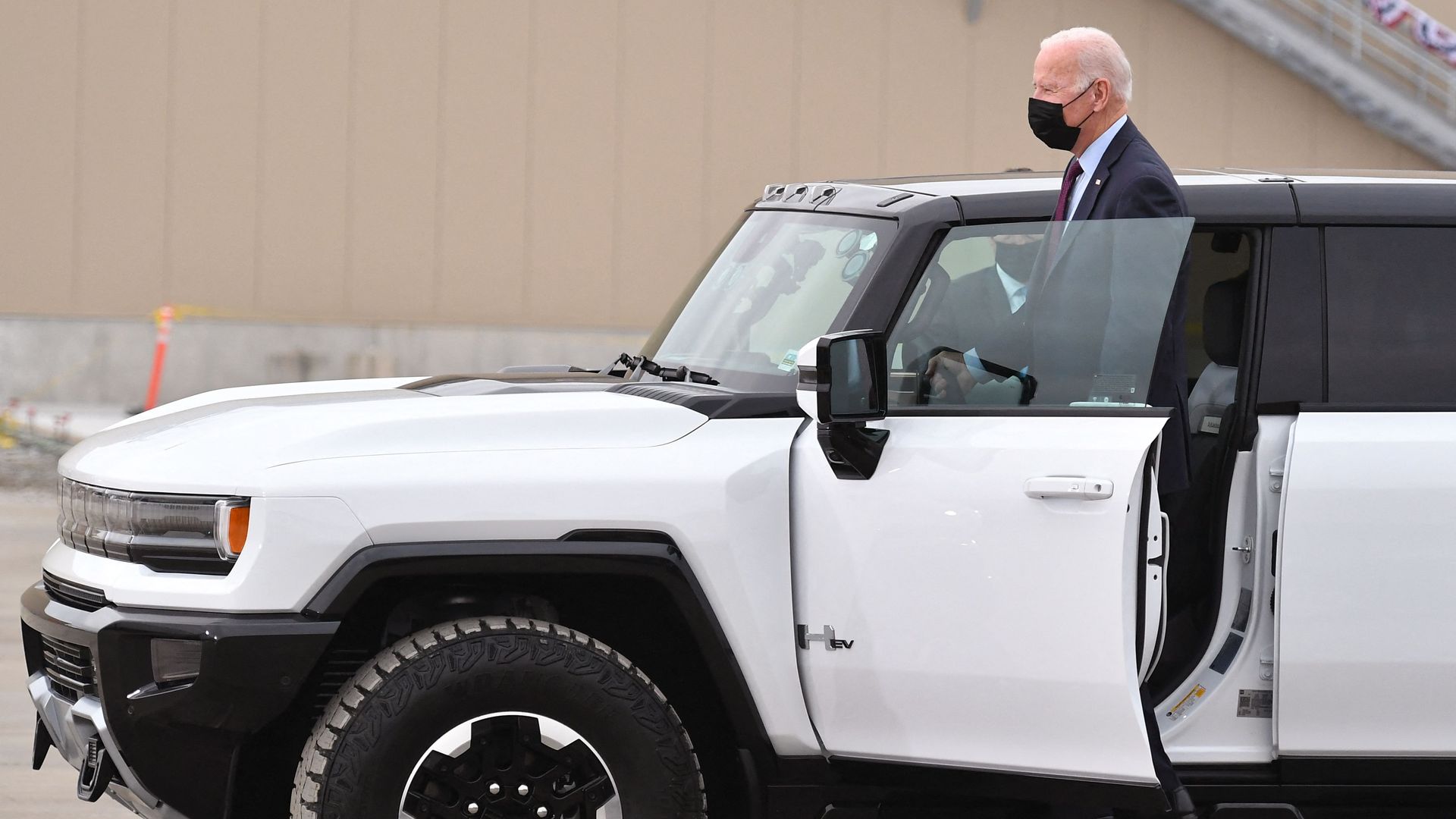 President Joe Biden test drives a GMC Hummer EV in Detroit, Michigan on November 17, 2021.