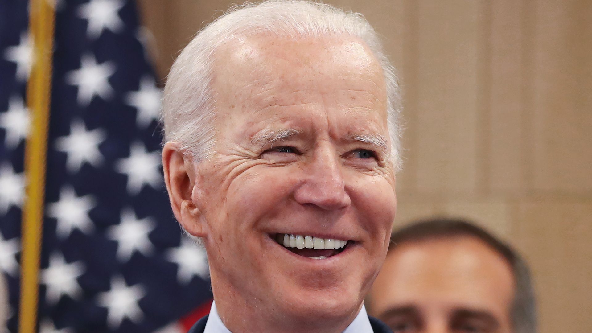 Joe Biden smiles at a campaign event