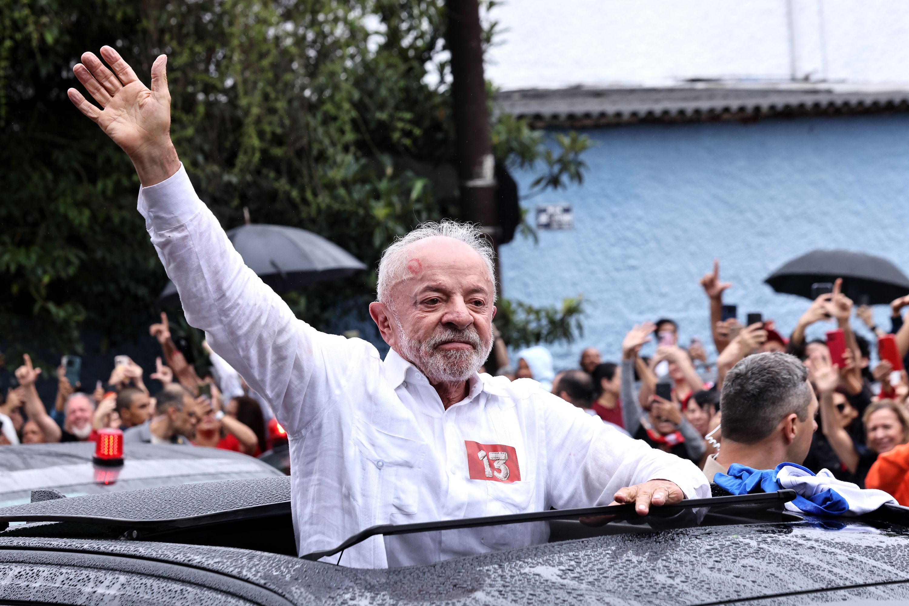 Brazilian president Luiz Inácio Lula Da Silva greets supporters in Sao Paulo after casting his vote yesterday.