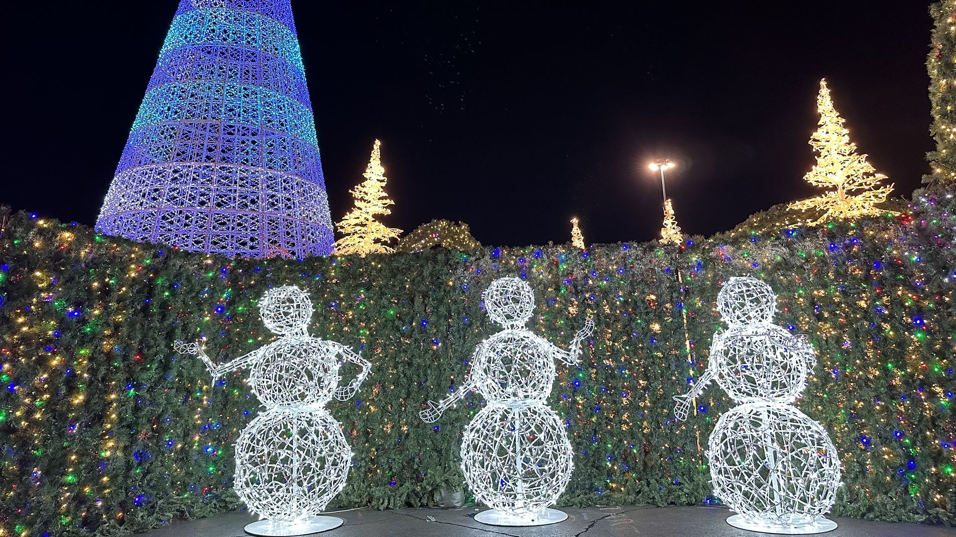 Three lit up snowmen