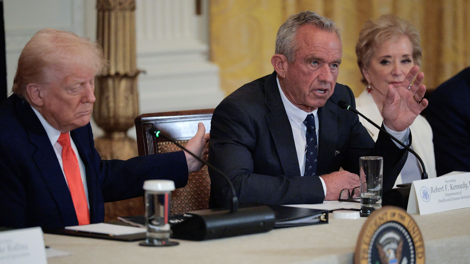 U.S. President Donald Trump, Health and Human Services Secretary Robert F. Kennedy Jr. and Education Secretary Linda McMahon hold an event for a new Make America Healthy Again Commission report in the East Room of the White House on May 22, 2025 in Washington, DC. 
