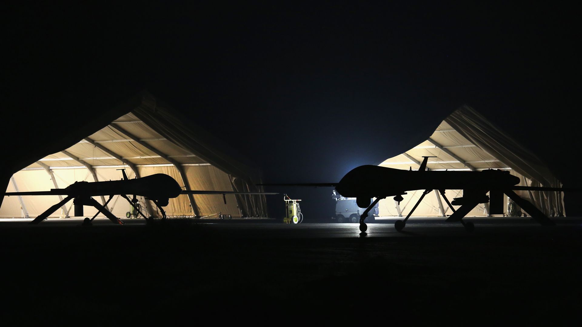 U.S. Air Force Predator drones at base at night