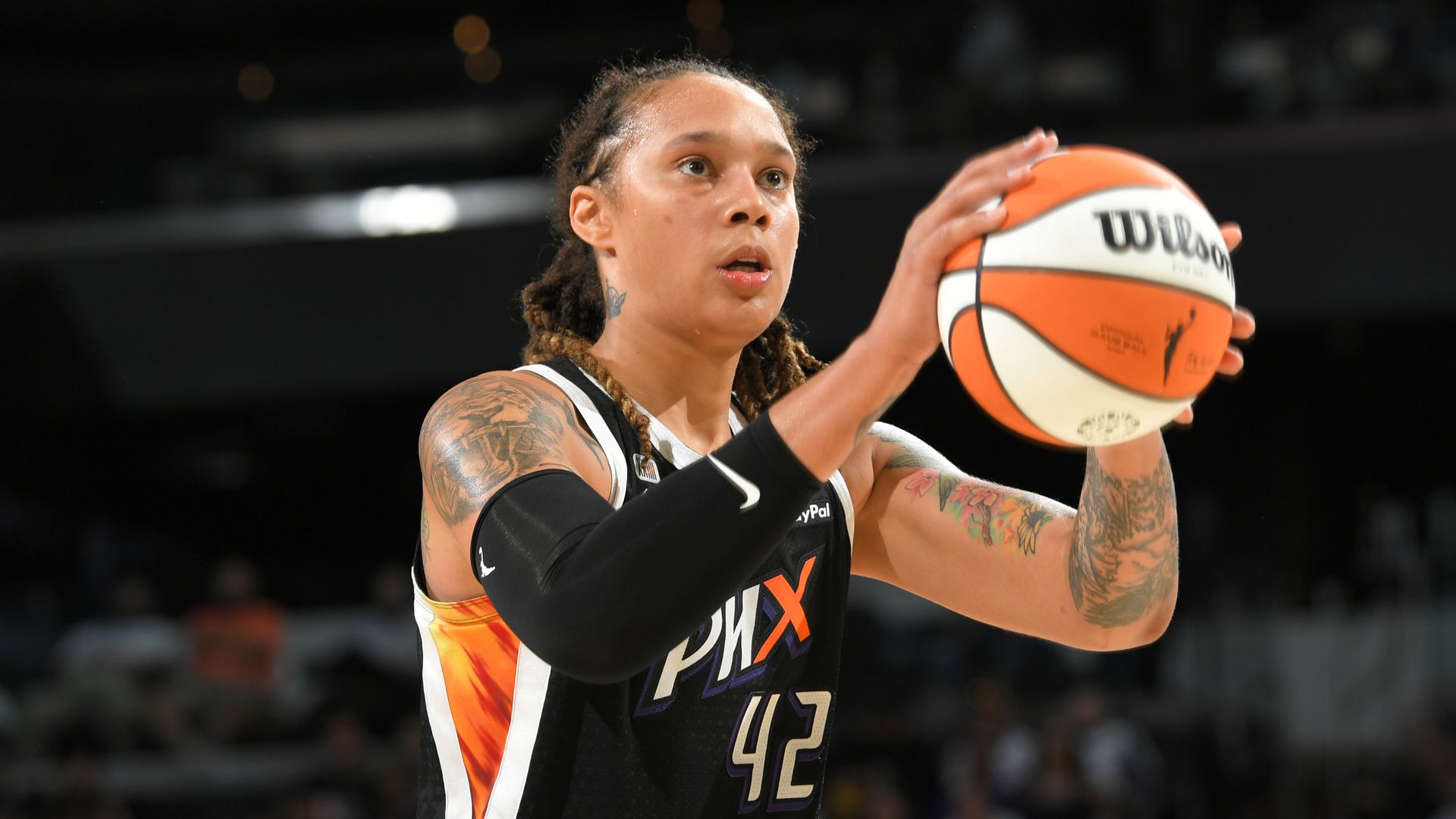 Brittney Griner #42 of the Phoenix Mercury looks on during the game against the Chicago Sky during Game One of the 2021 WNBA Finals on October 10, 2021 at Footprint in Phoenix, Arizona.