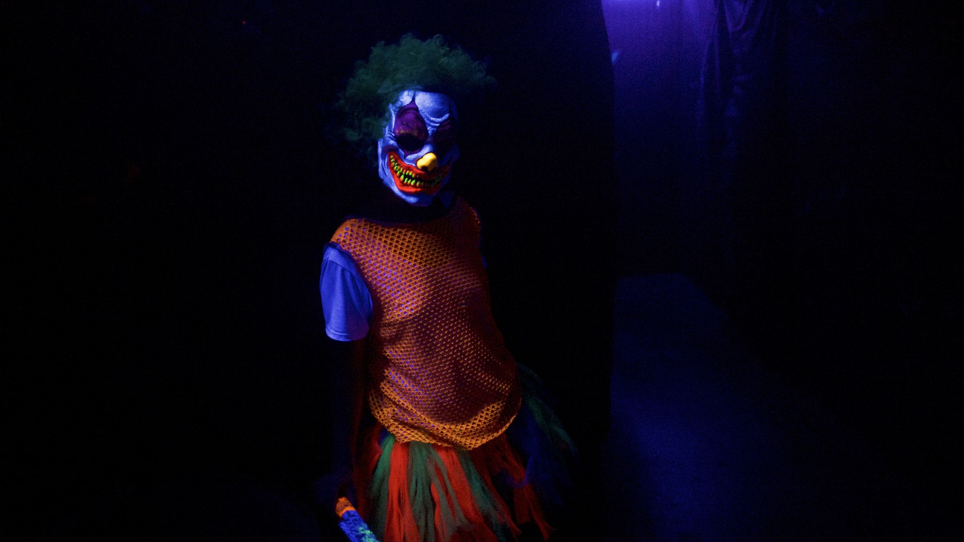 A spooky clown at a haunted house