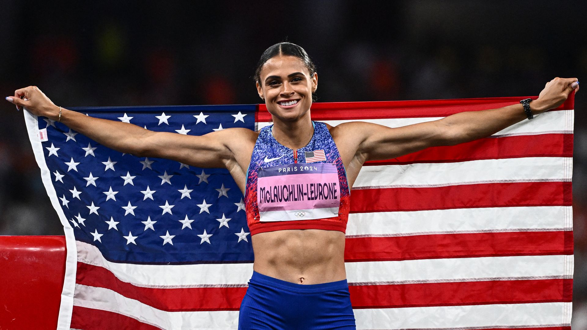 Sydney Mclaughlin-Levrone celebrates after winning the women's 400m hurdles final.