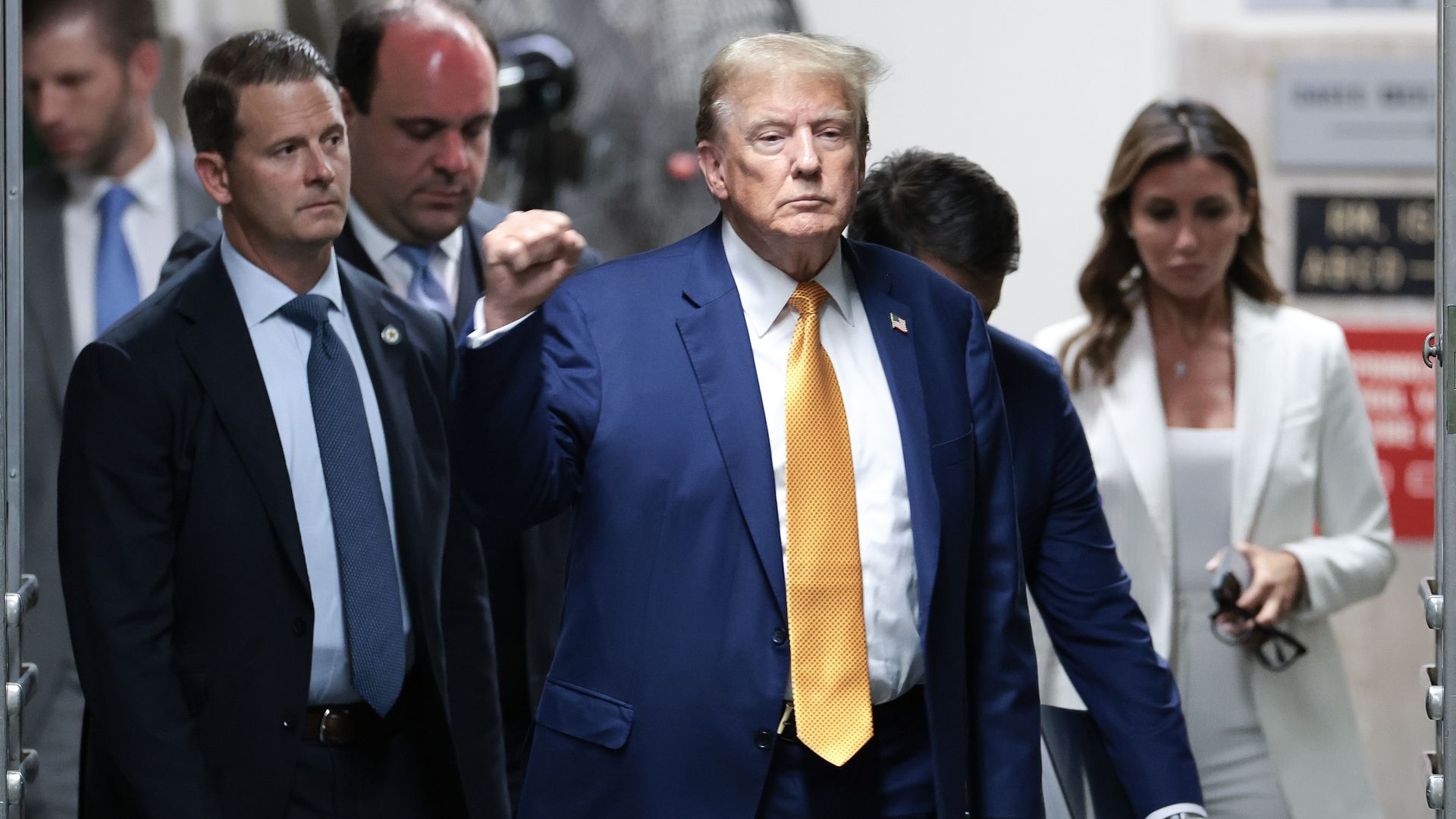 Former U.S. President Donald Trump returns from a break in his trial for allegedly covering up hush money payments at Manhattan Criminal Court on May 7, 2024 in New York City.