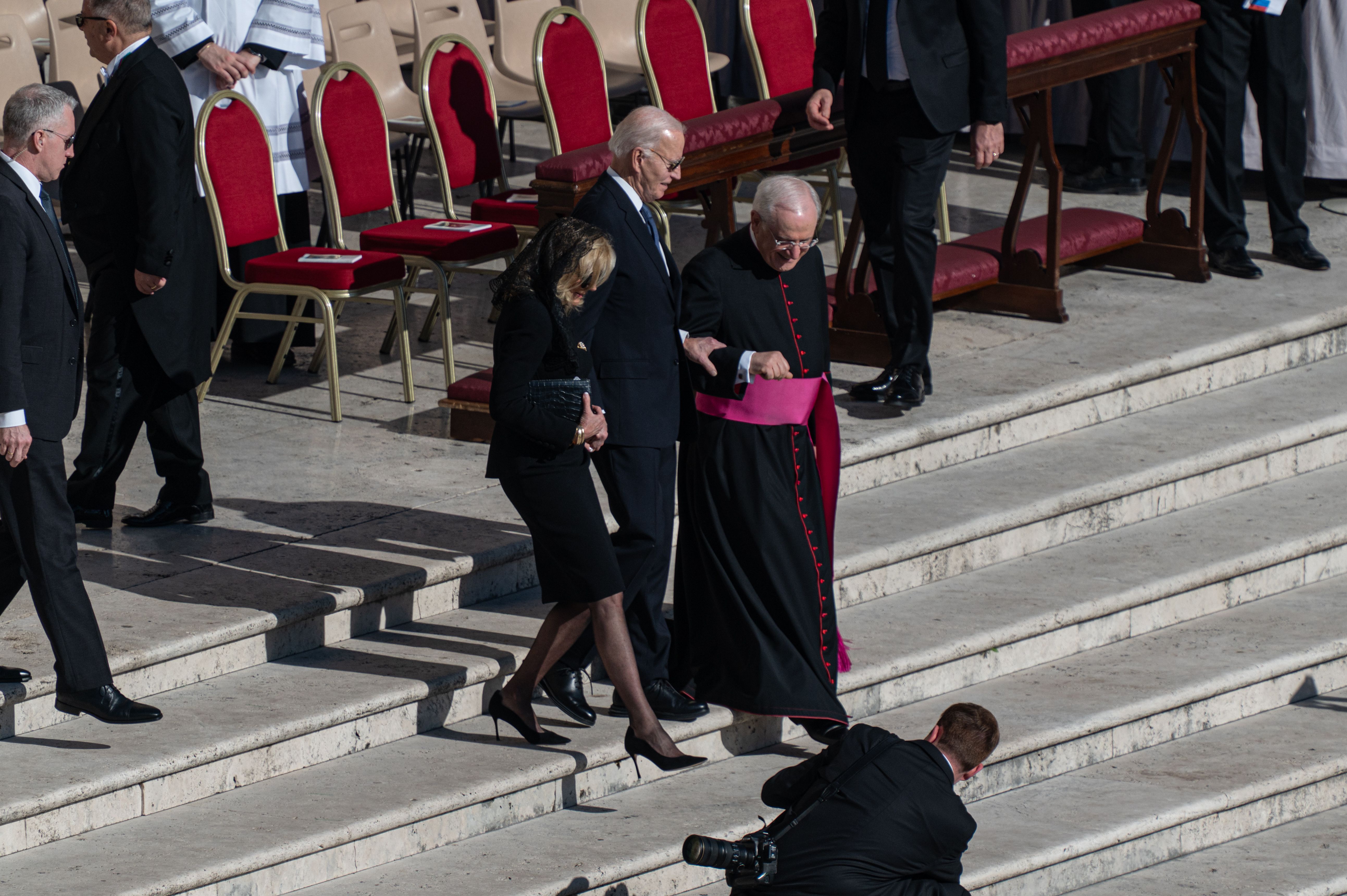 Former President Biden being helped down the steps of St. Peter's Basilica at Pope Francis' funeral at the Vatican last month.