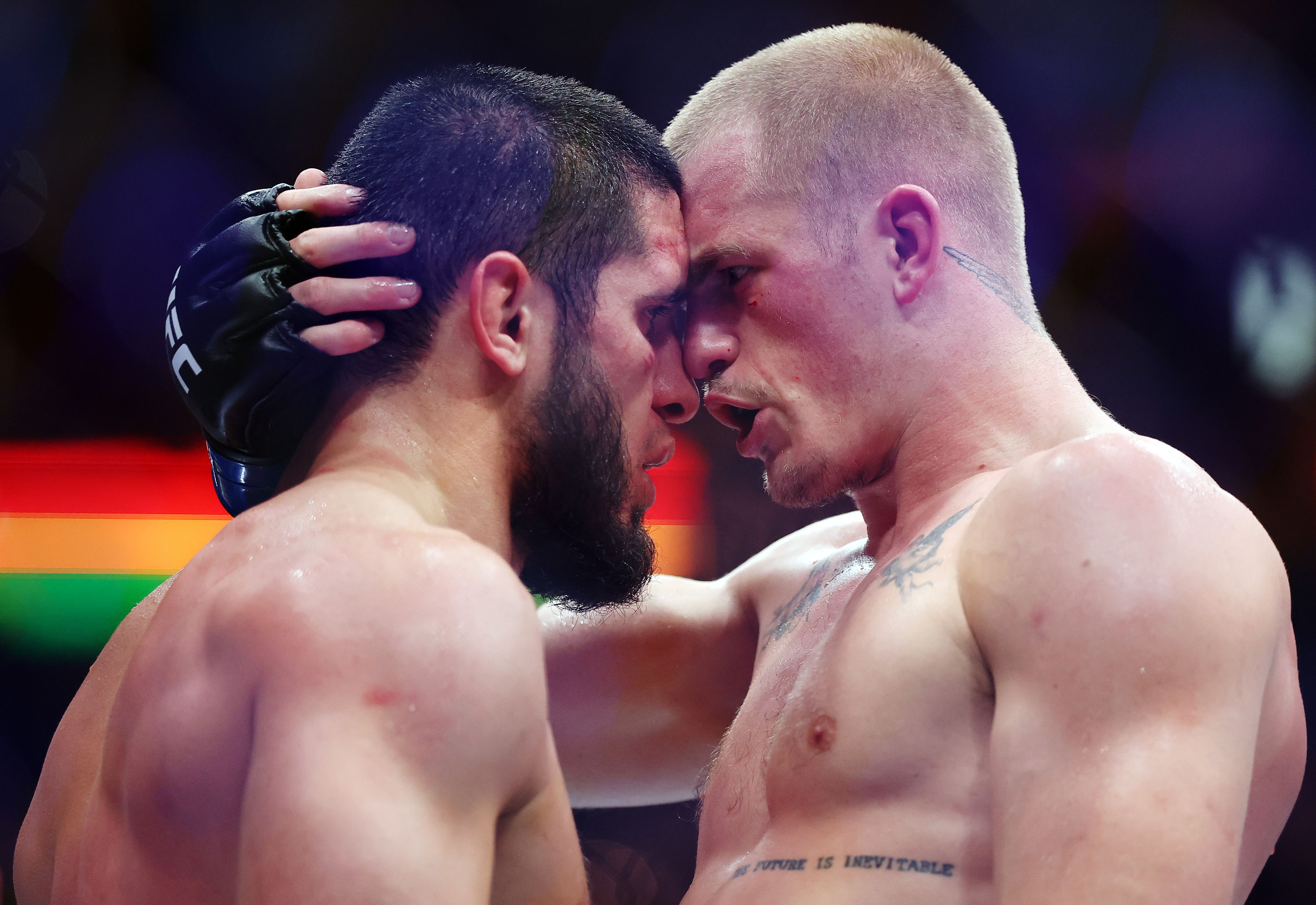 Islam Makhachev of Russia and Ian Machado Garry of Ireland embrace after Saturday's welterweight title bout In Philly.