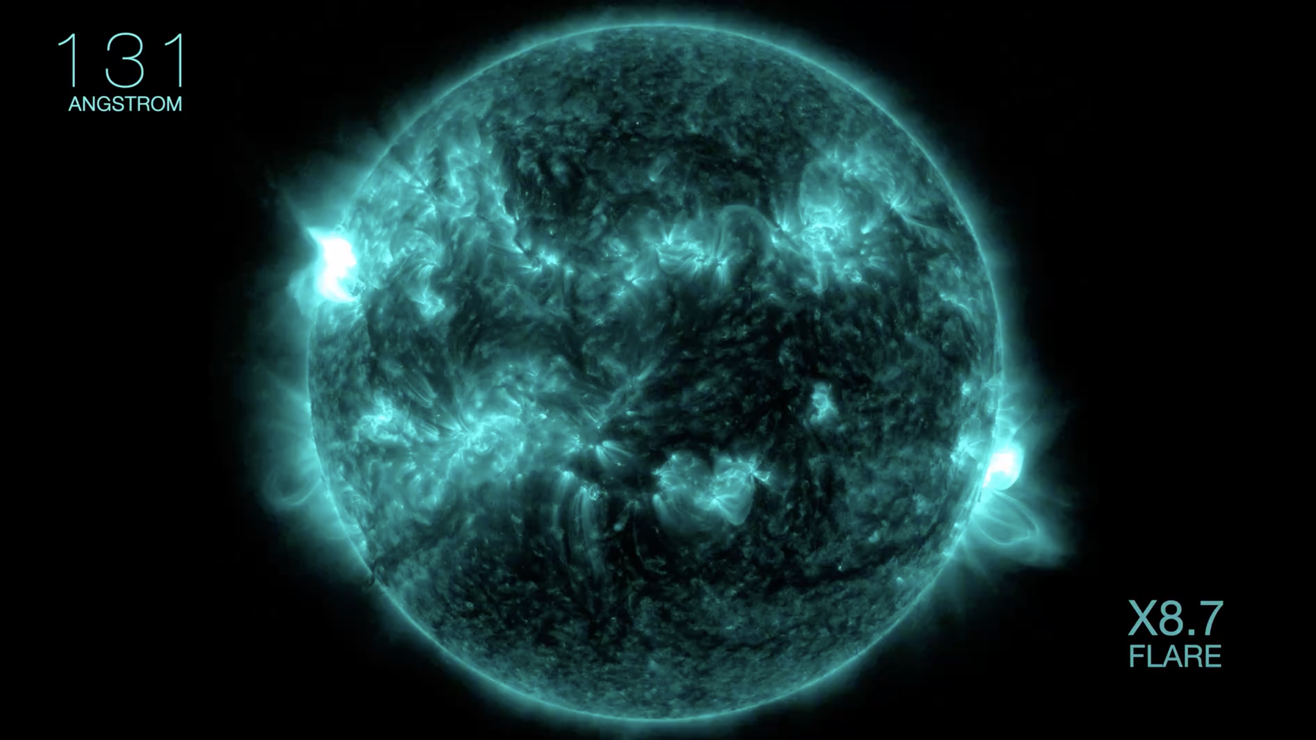 A screenshot of a NASA image capturing in blue the strongest solar flare of the sun's cycle